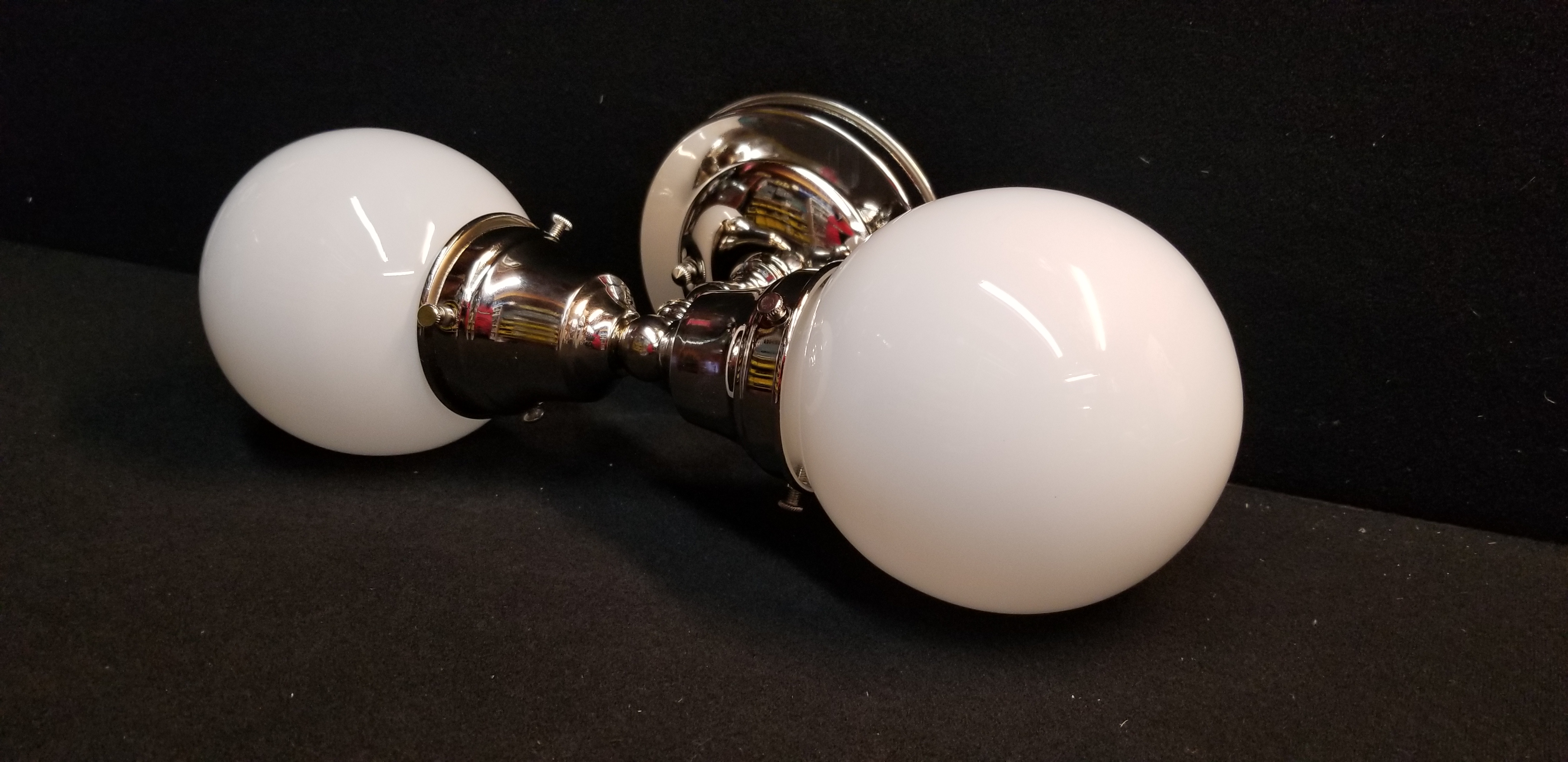 Cool wall sconce in nickel
