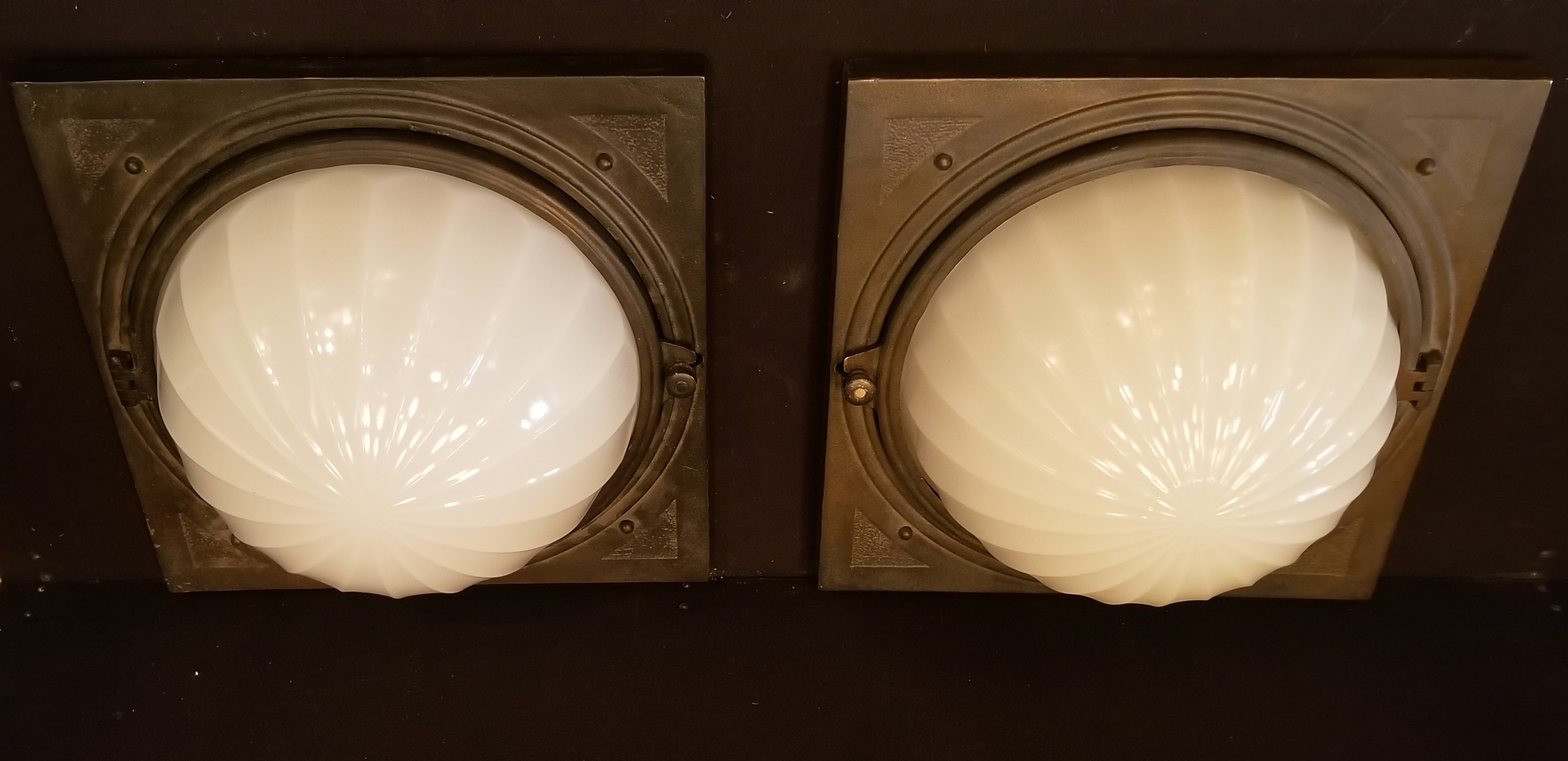 2X elevator lights in cast bronze
