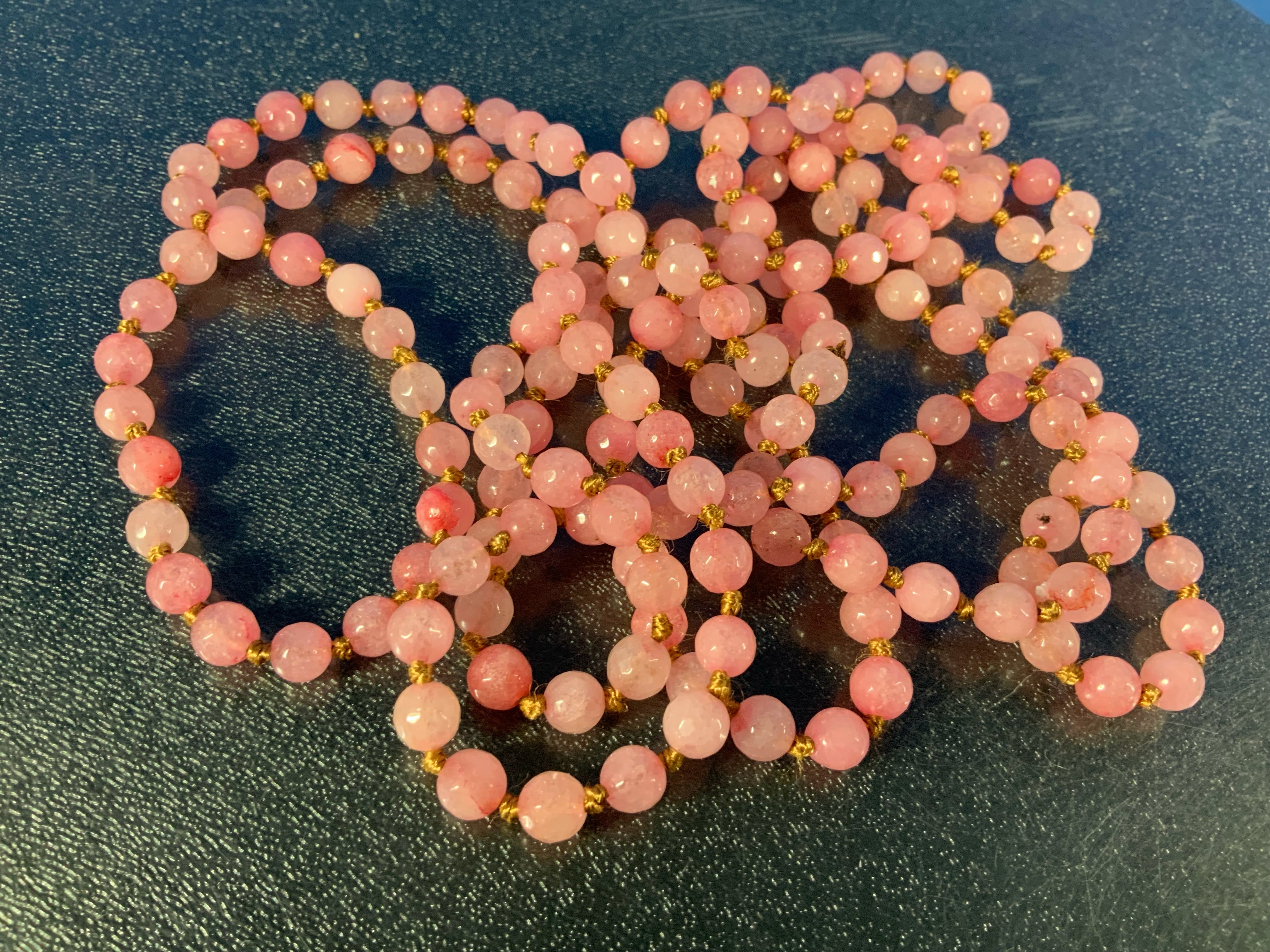 Rose Quartz Faceted Knotted Beads Necklace 56 Inches