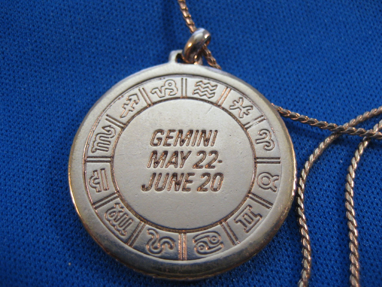 Avon Gold and Silver Genini Necklace