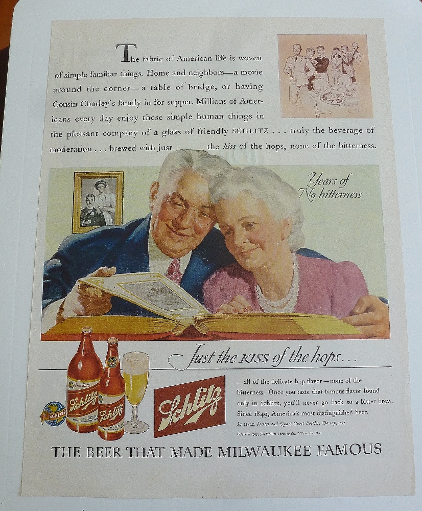 1943 Schlitz Beer w/Older Couple Looking At Photo Album