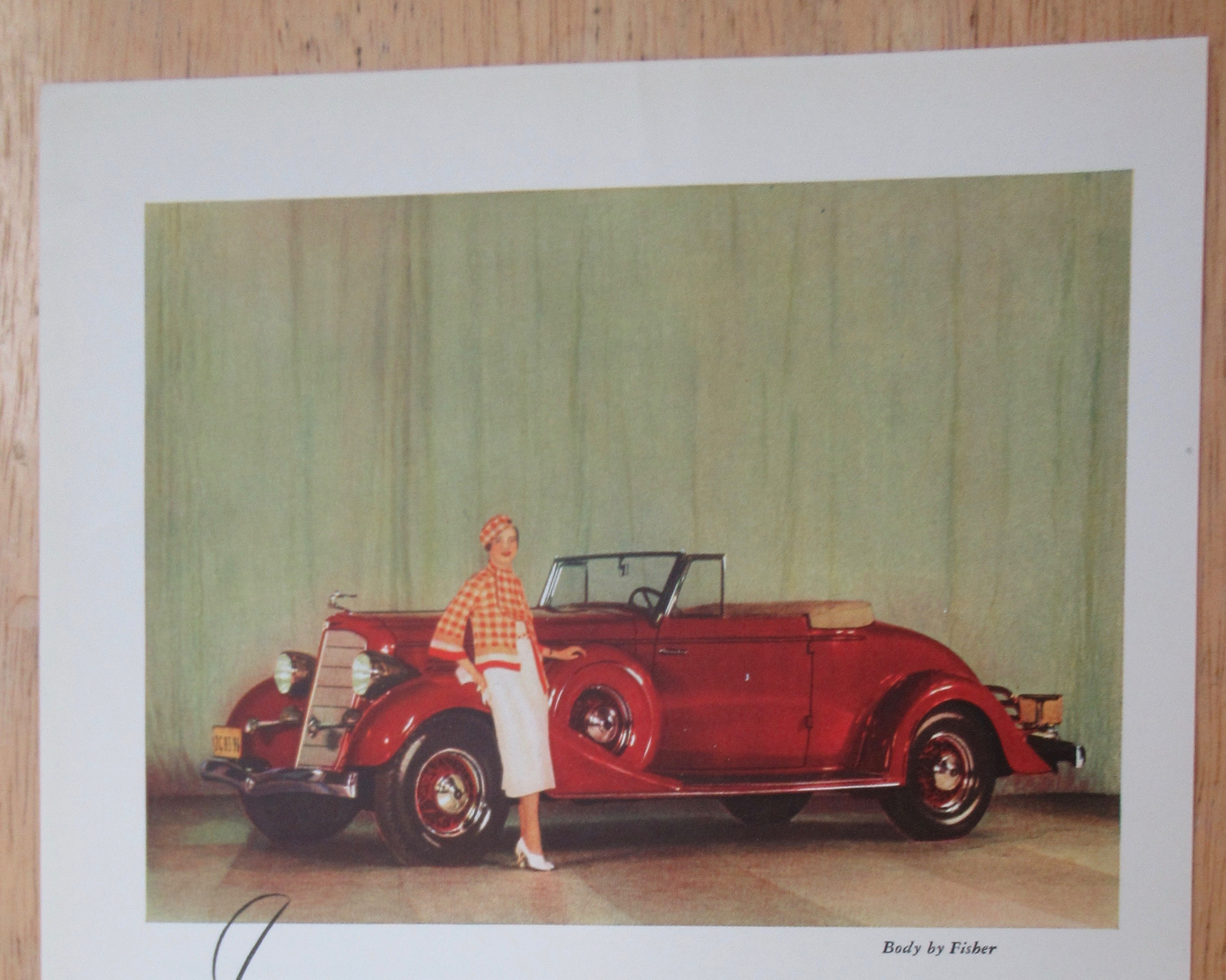 1934 Buick with a Lovely Woman Leaning On Car