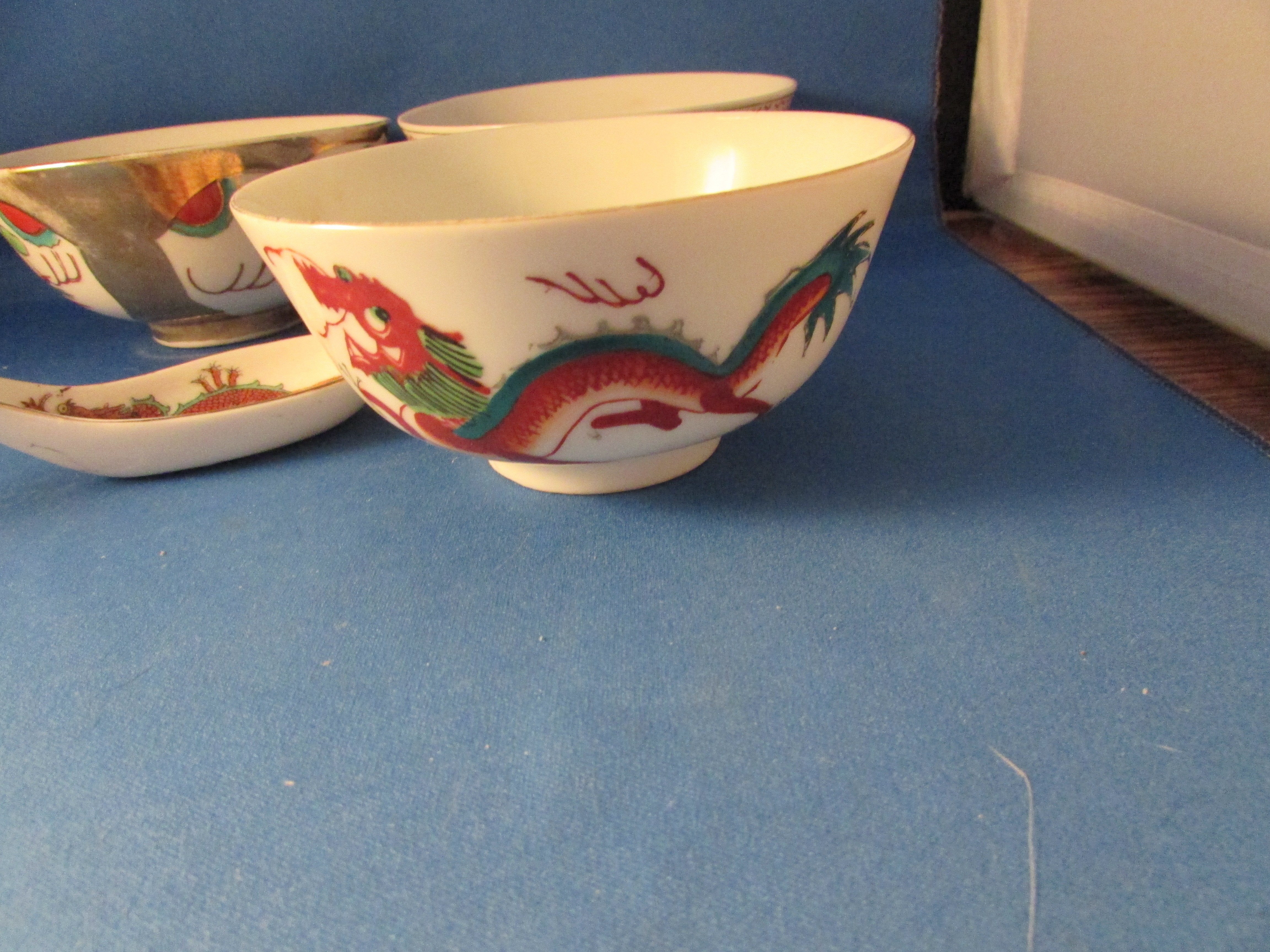 Three Oriental Bowls With Spoon