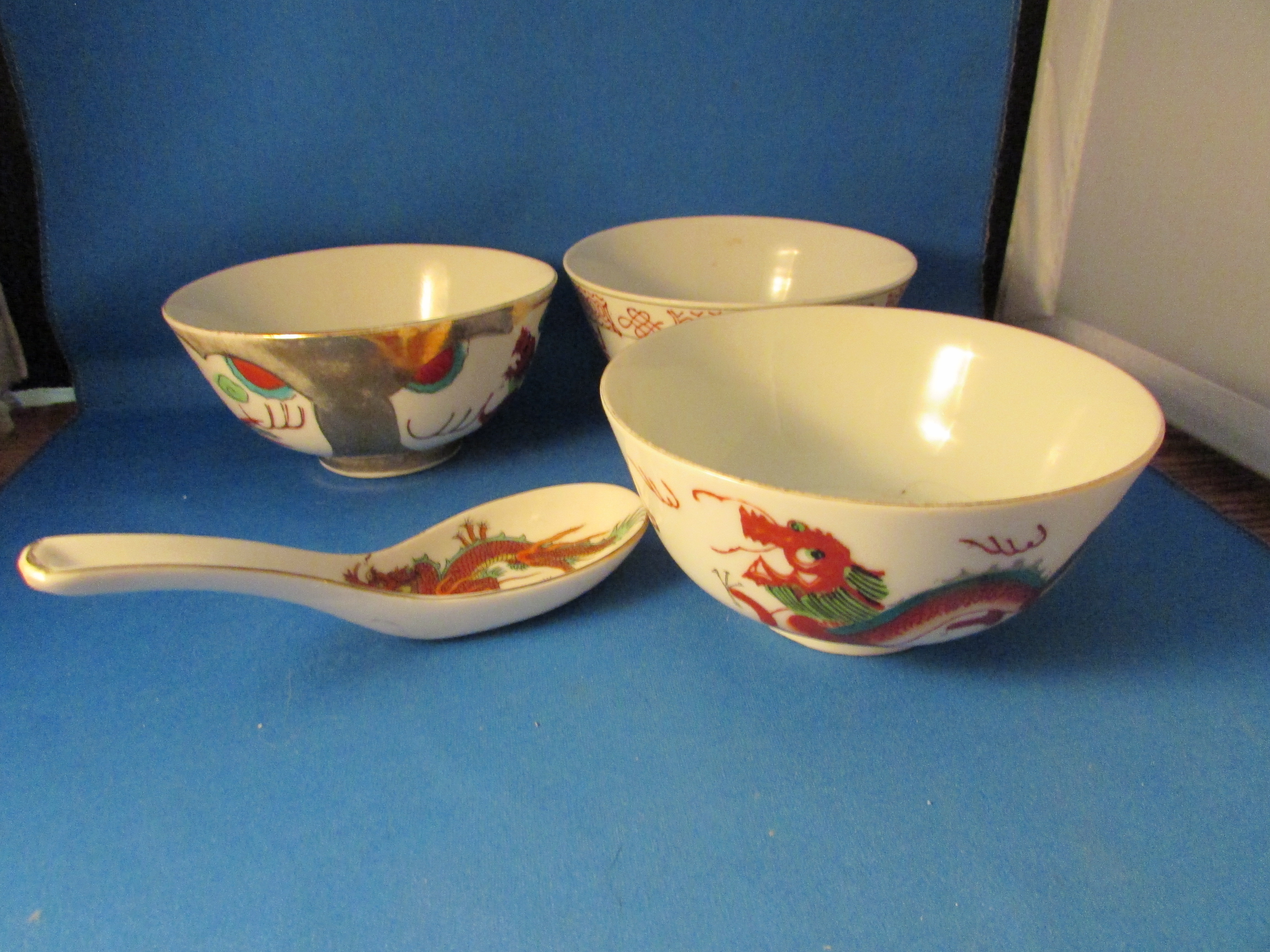 Three Oriental Bowls With Spoon