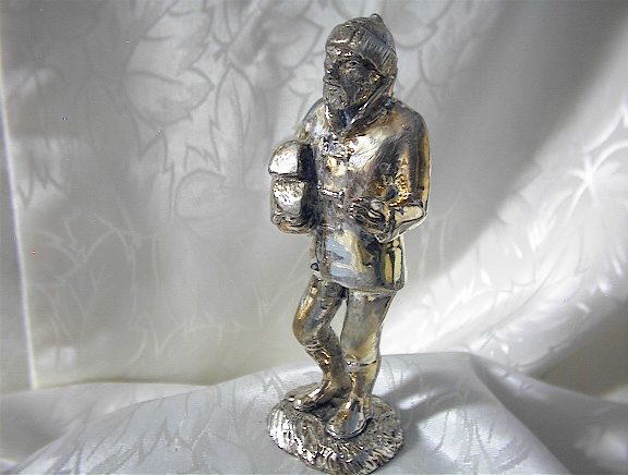 English Silverplate Woodsman With Logs