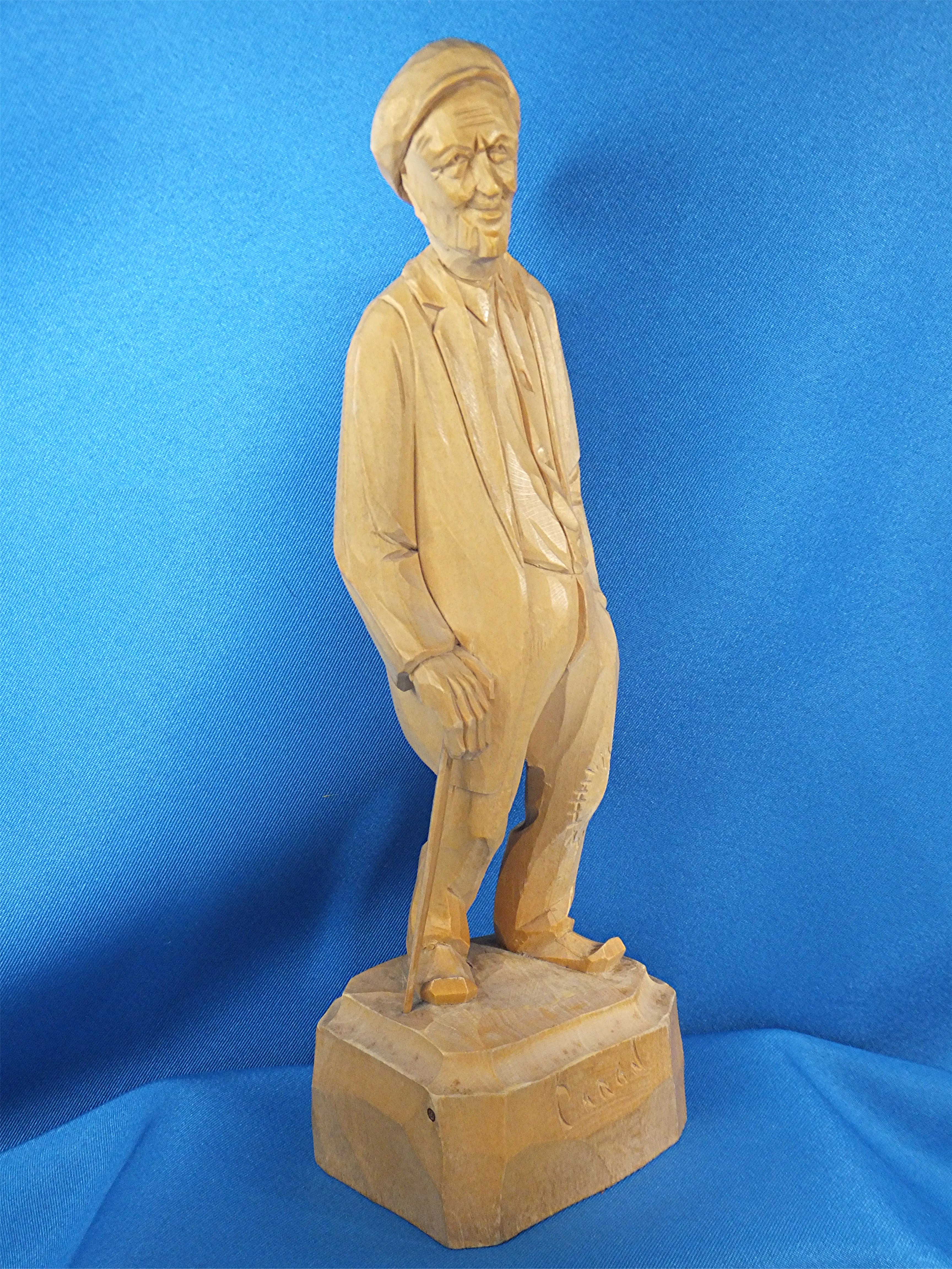 Wood Carving Old man with walking stick, by  Caron