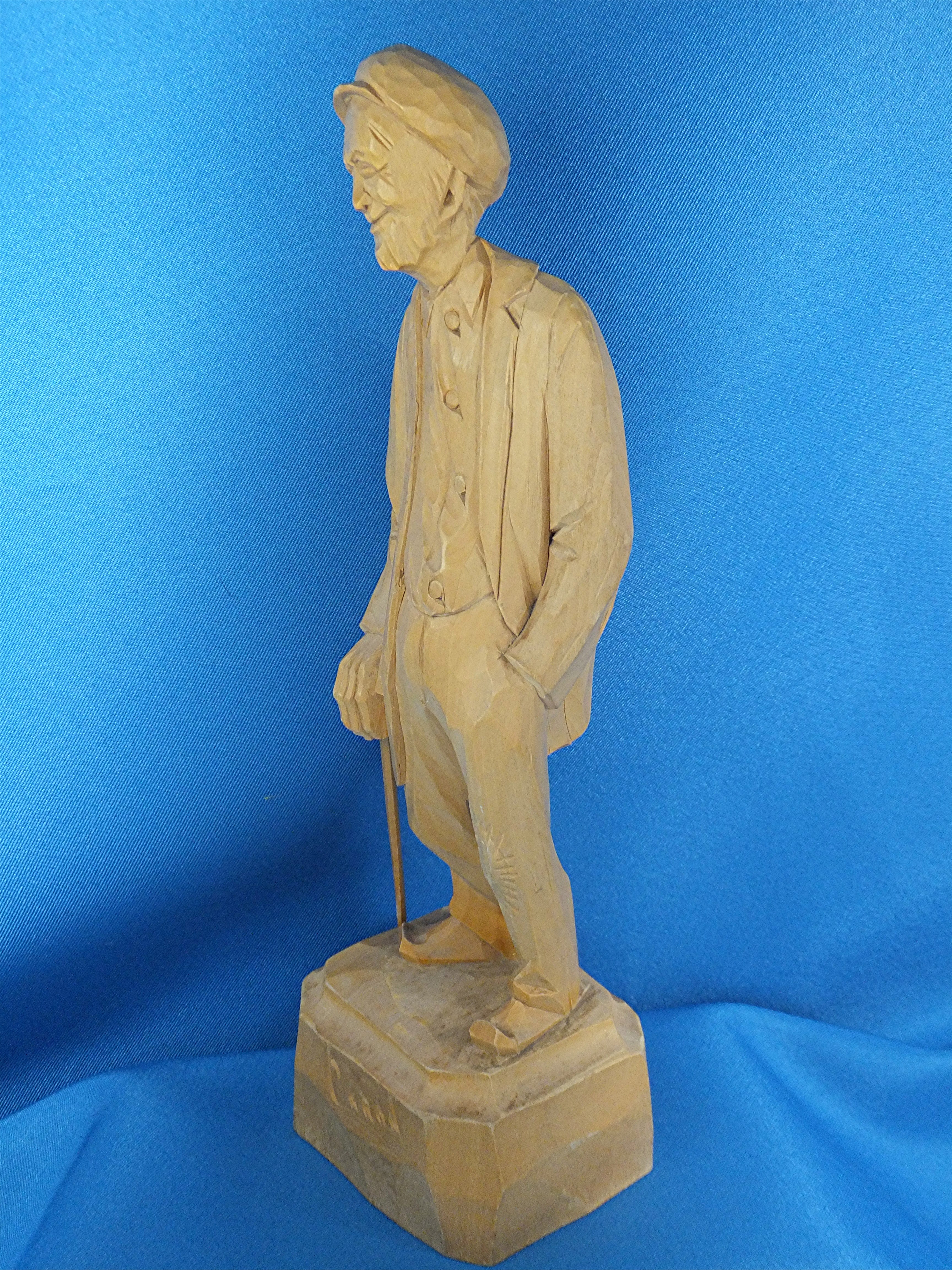 Wood Carving Old man with walking stick, by  Caron