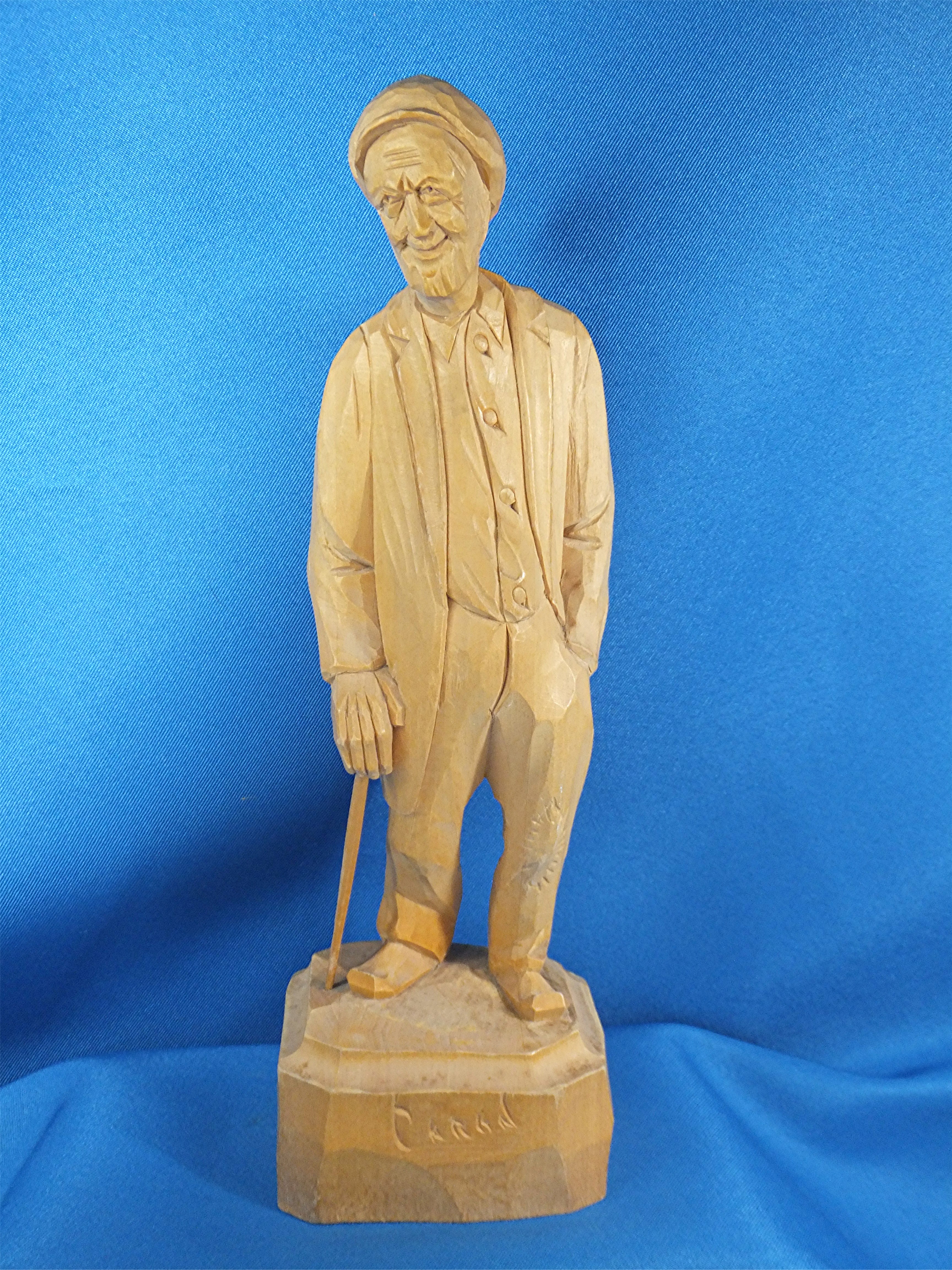 Wood Carving Old man with walking stick, by Caron
