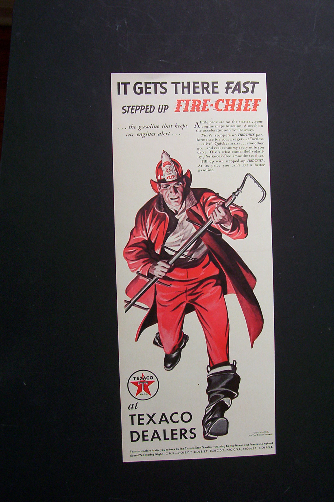 1940 Texaco Dealers with Fireman Running with Hook