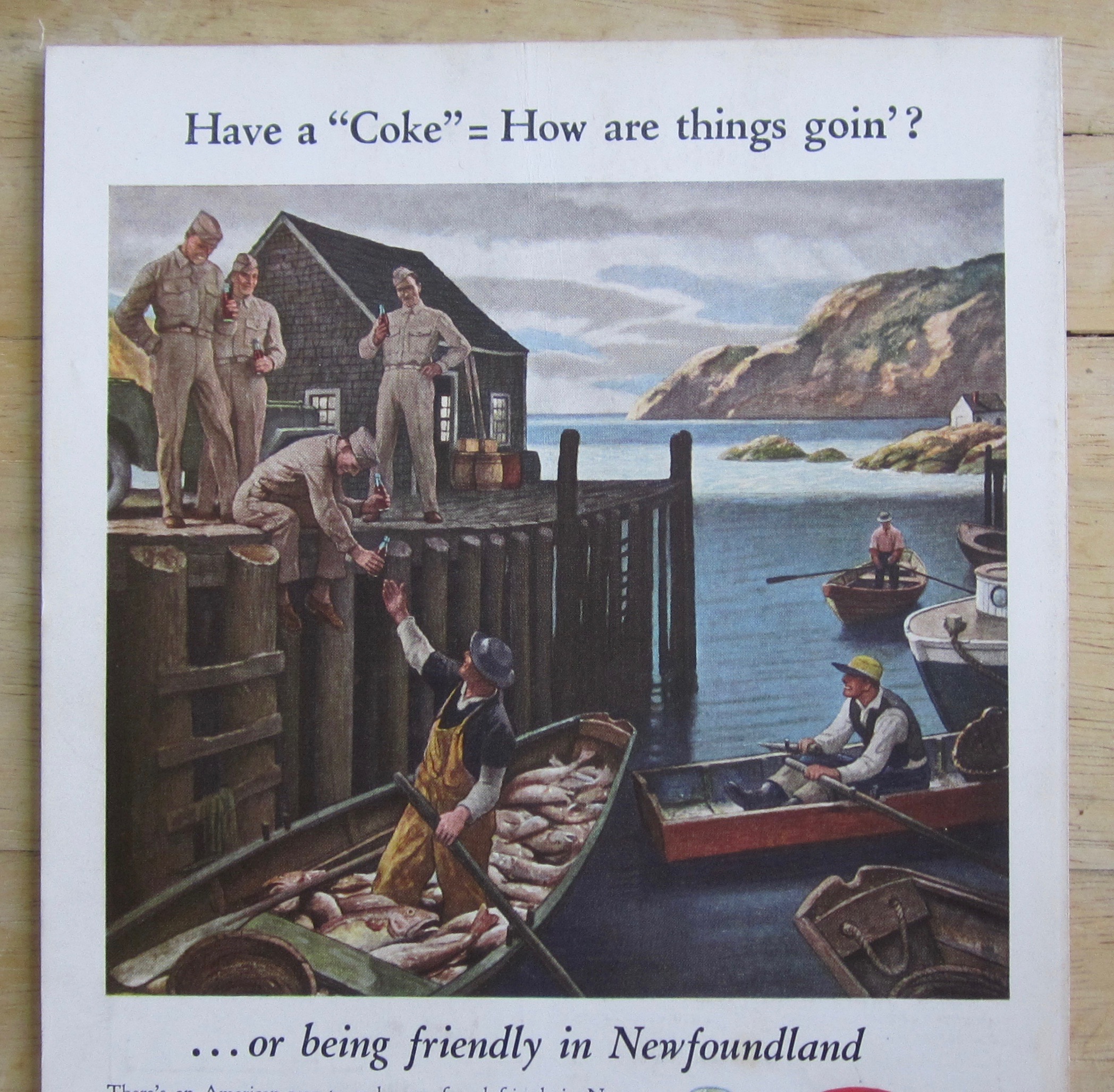 1944 Coca Cola w Soldier Giving Soda To Fisherman