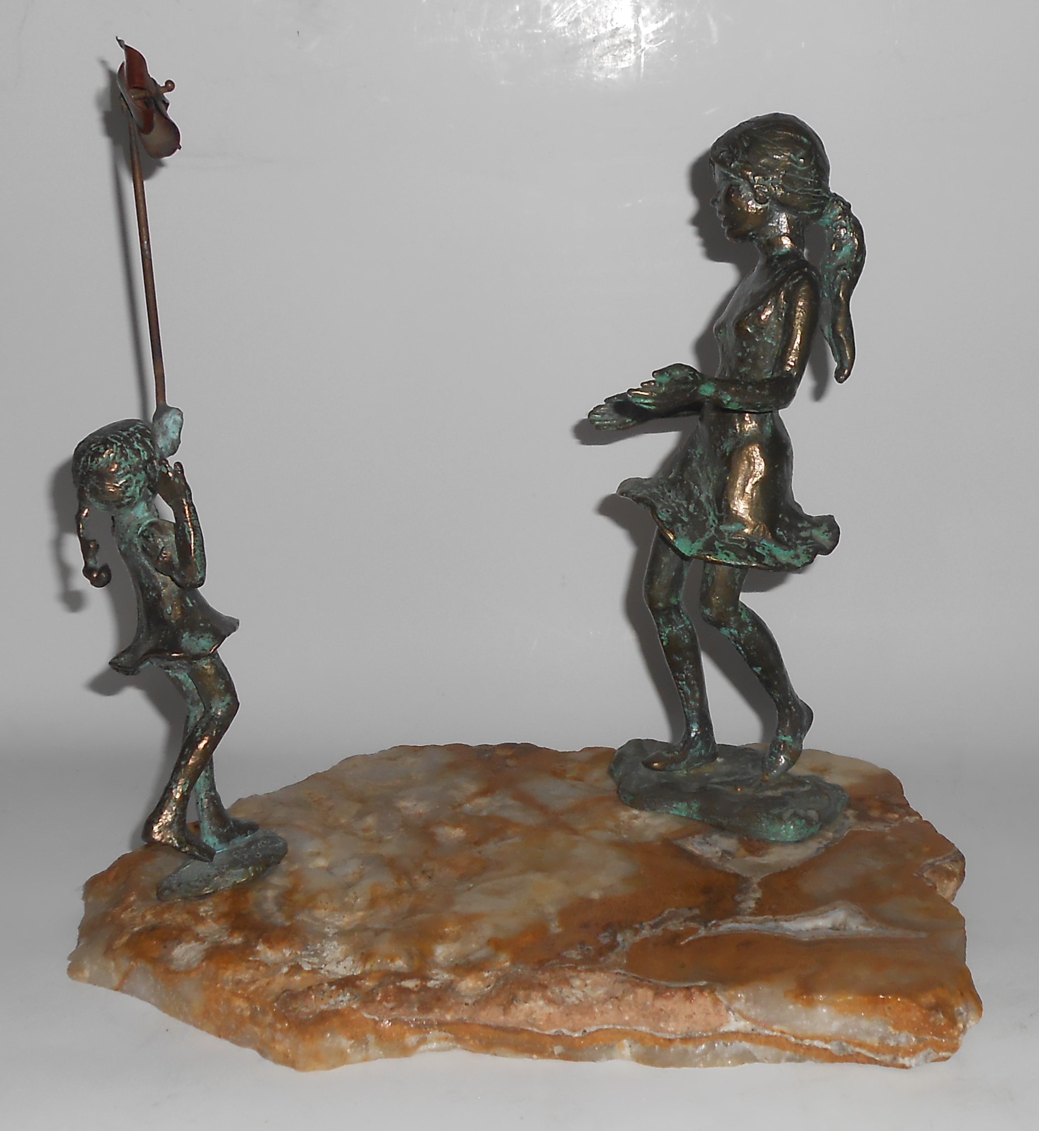 Bijan Art Metal 2 Girls / Pinwheel Sculpture On Quartz