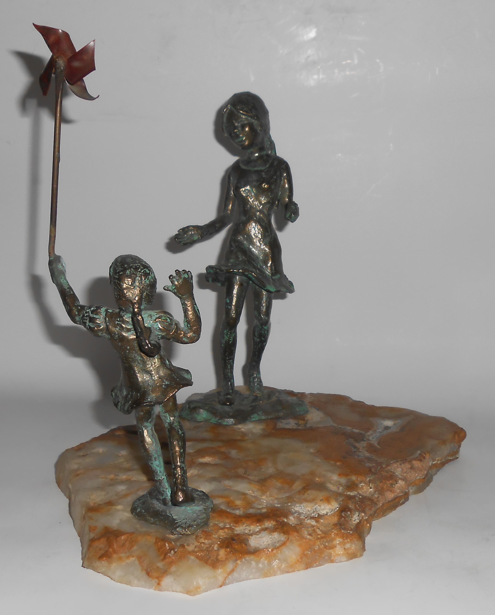 Bijan Art Metal 2 Girls / Pinwheel Sculpture On Quartz