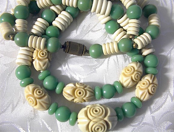Necklace, carved Plastic Lucite, 2 strand