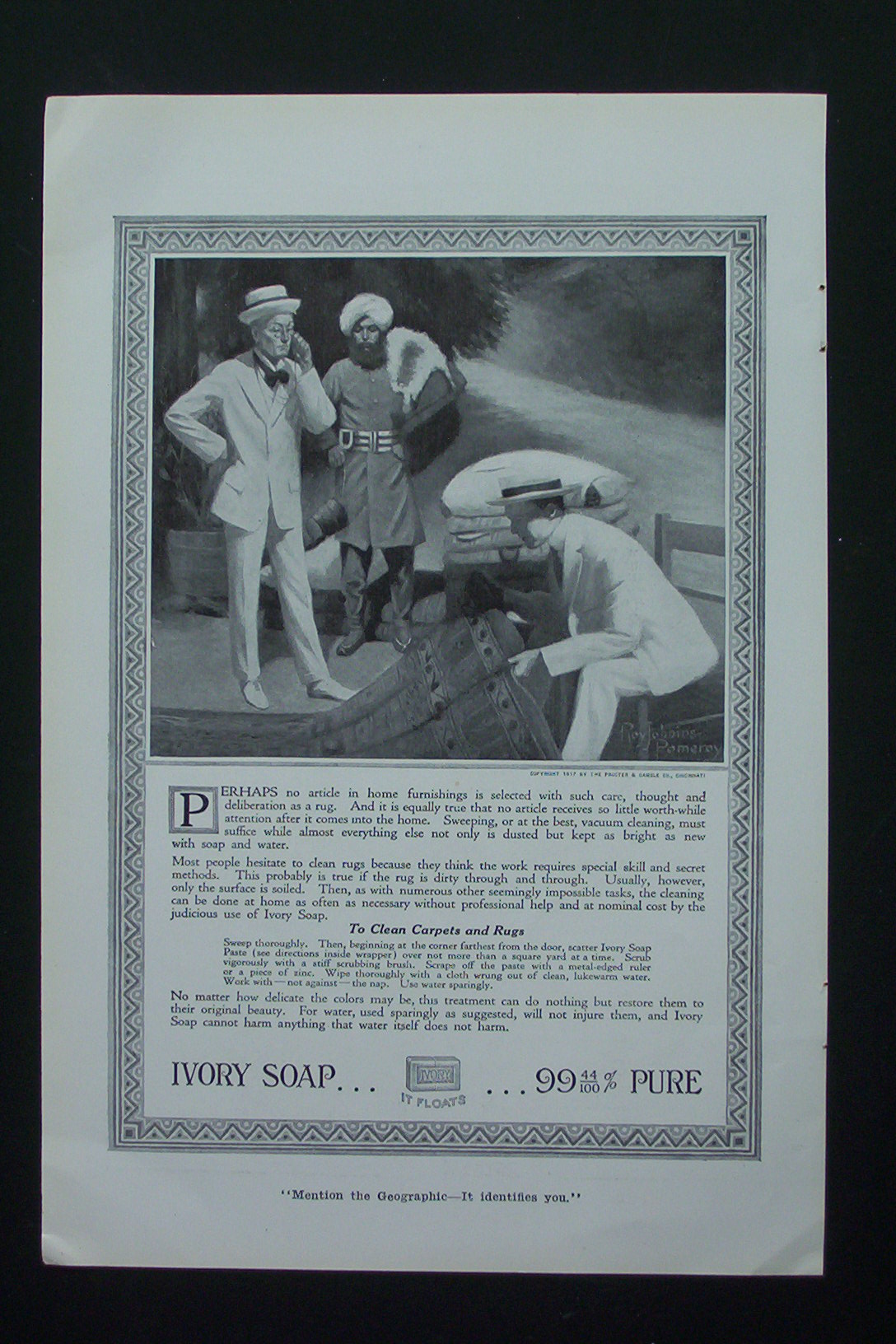 1917 Ivory Soap with Two Men Looking at Rug