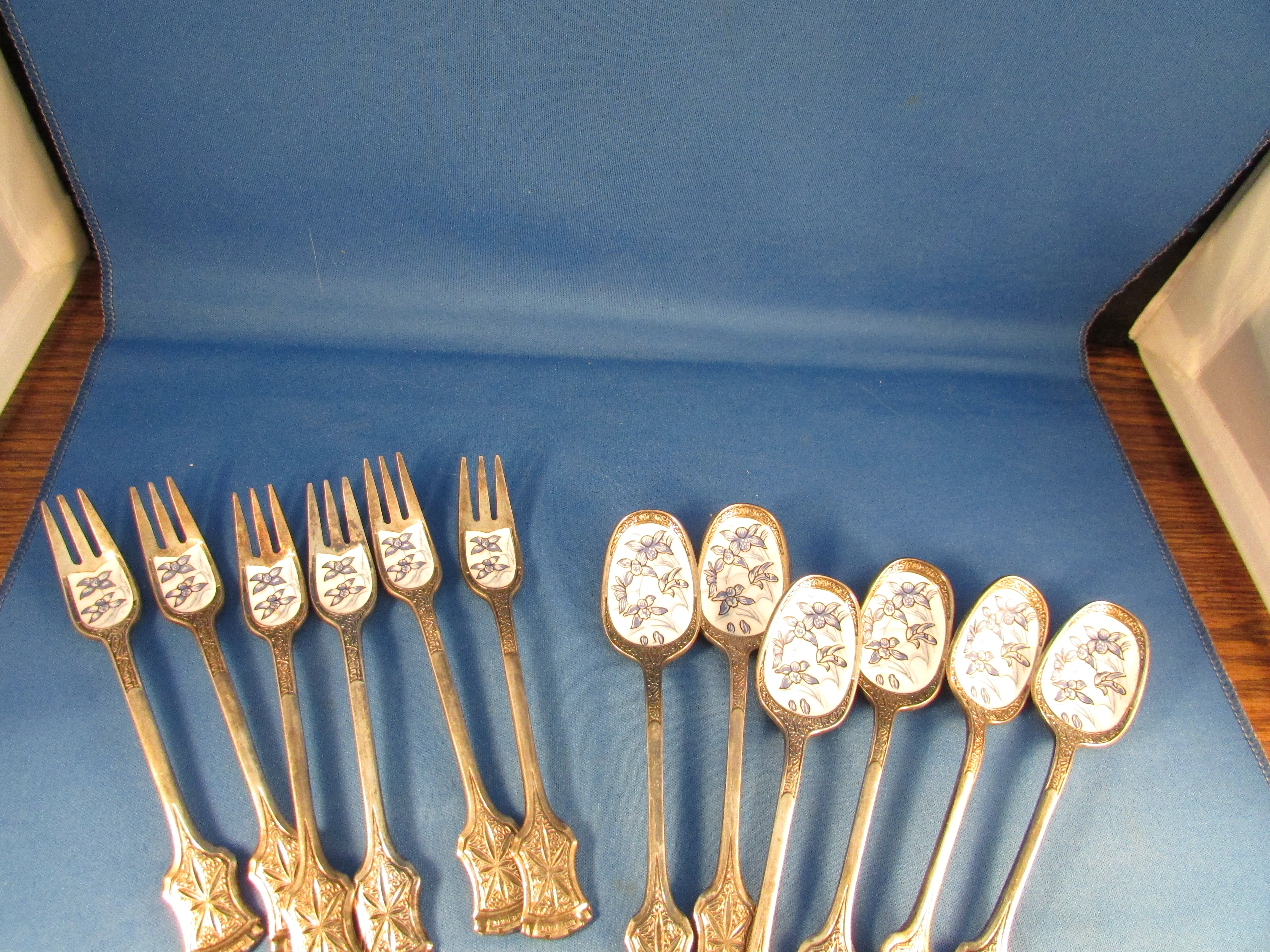 Six Enamel Forks and Spoons