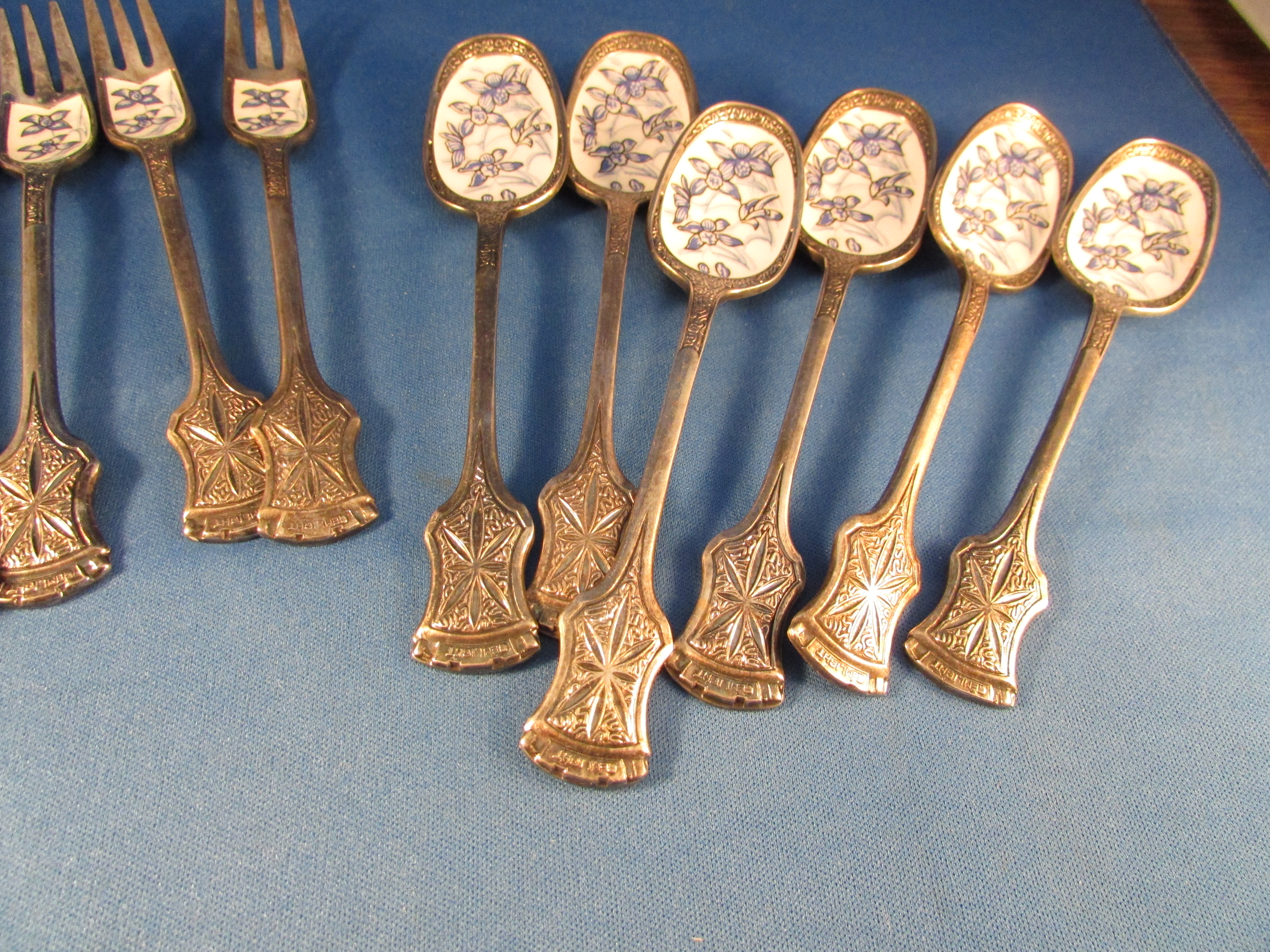 Six Enamel Forks and Spoons