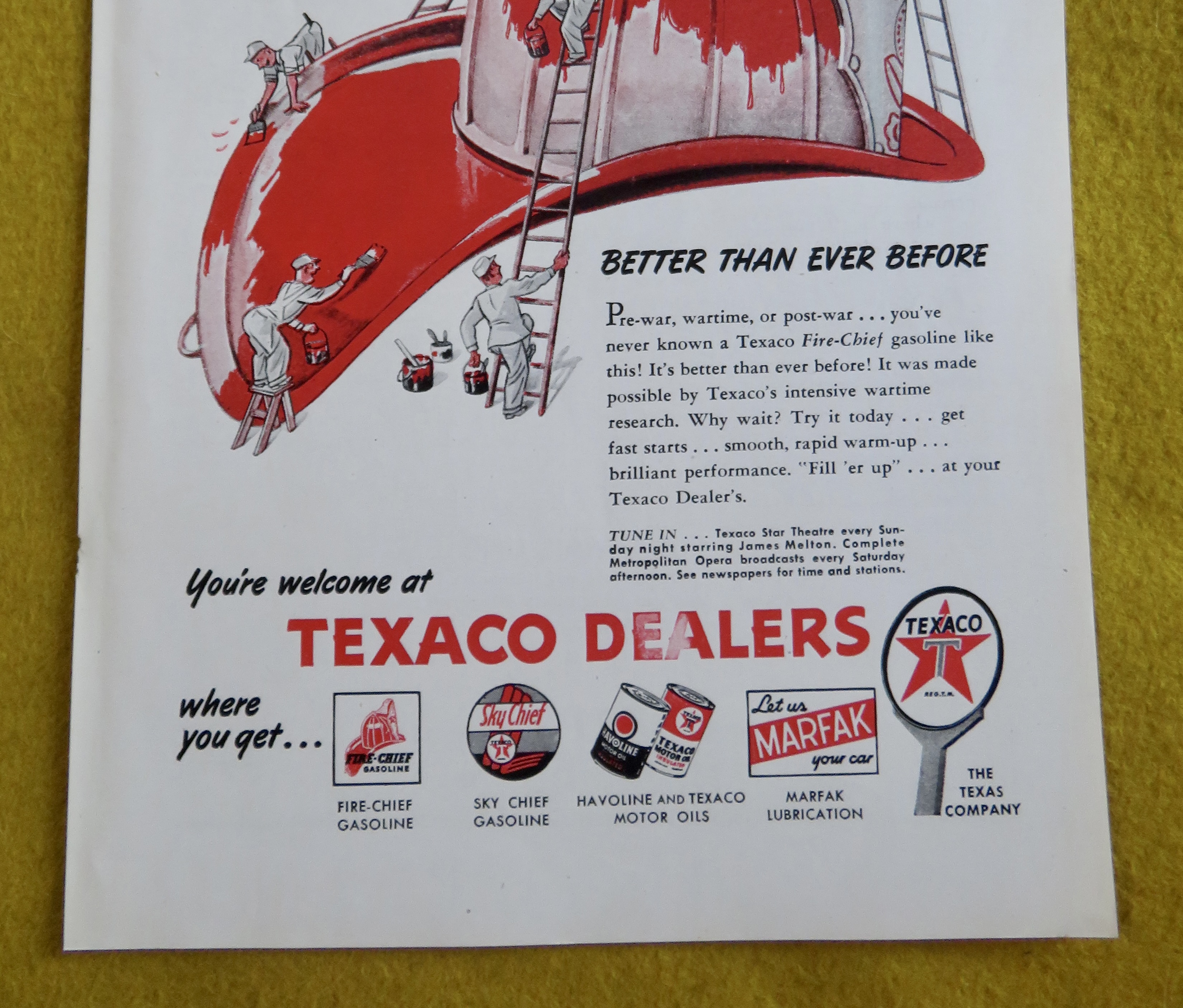 1946 Texaco Dealers with Little Men Cleaning Helmet