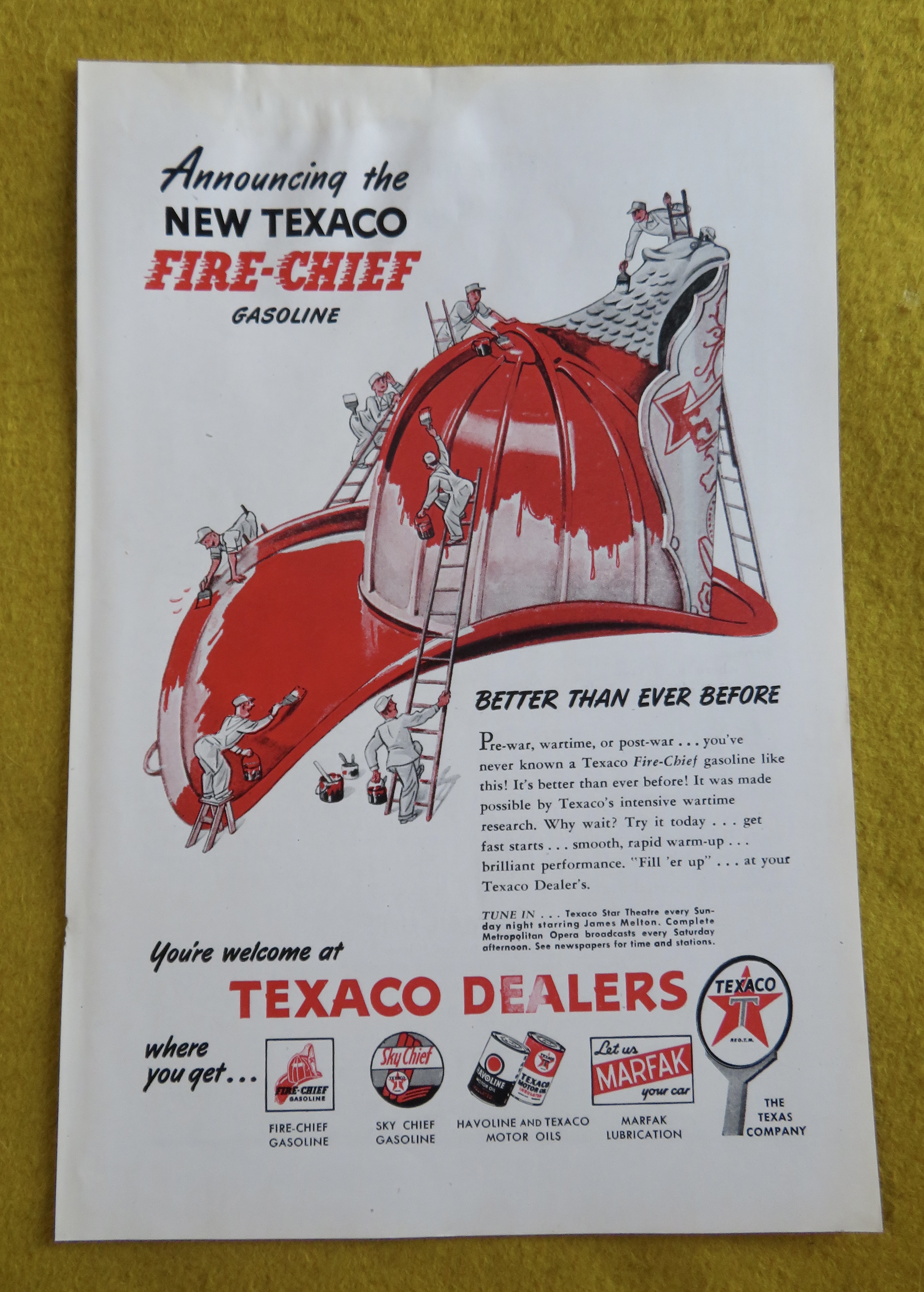 1946 Texaco Dealers with Little Men Cleaning Helmet