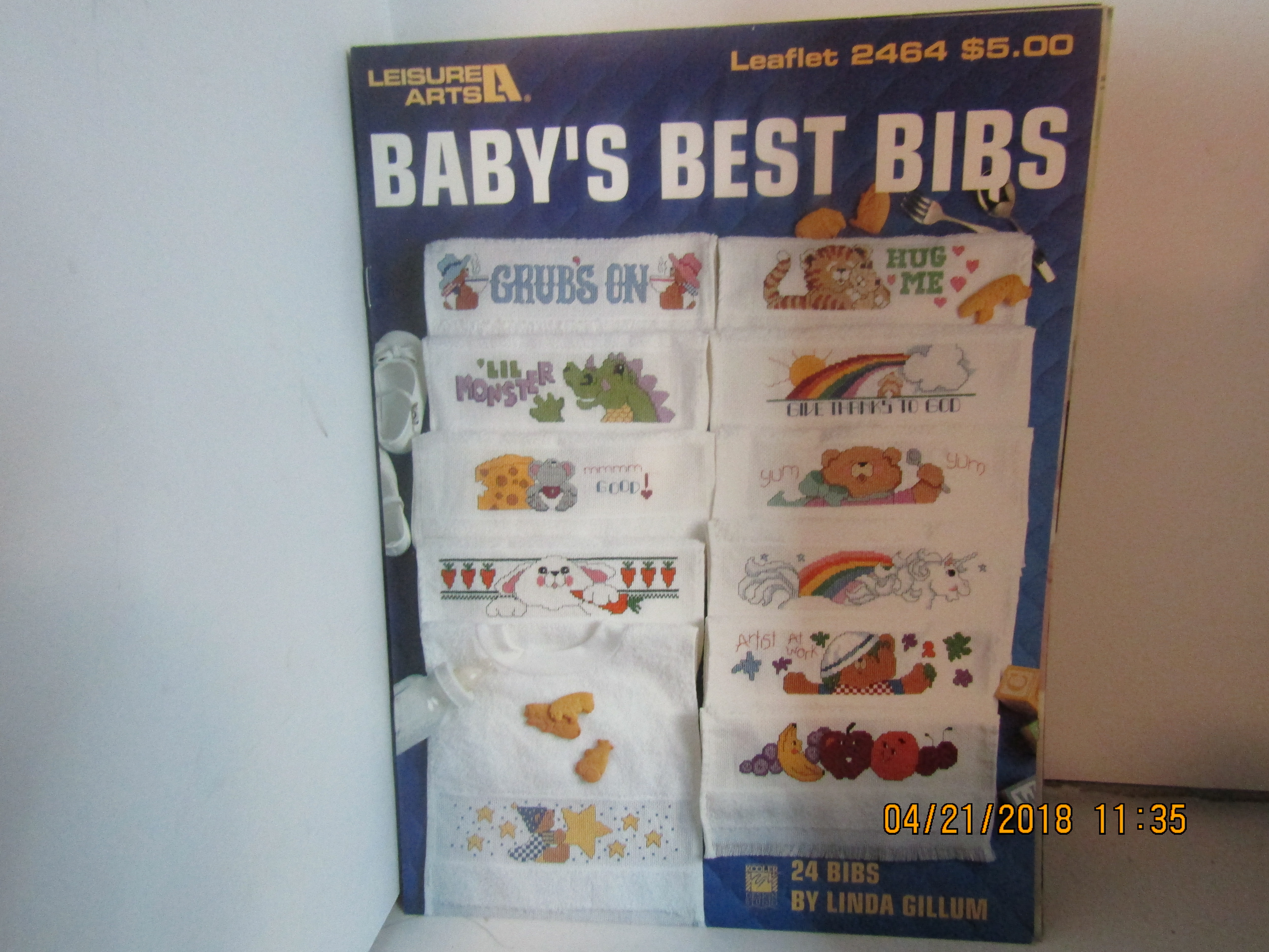 Leisure Arts Cross Stitch Baby's Best Bibs #2464