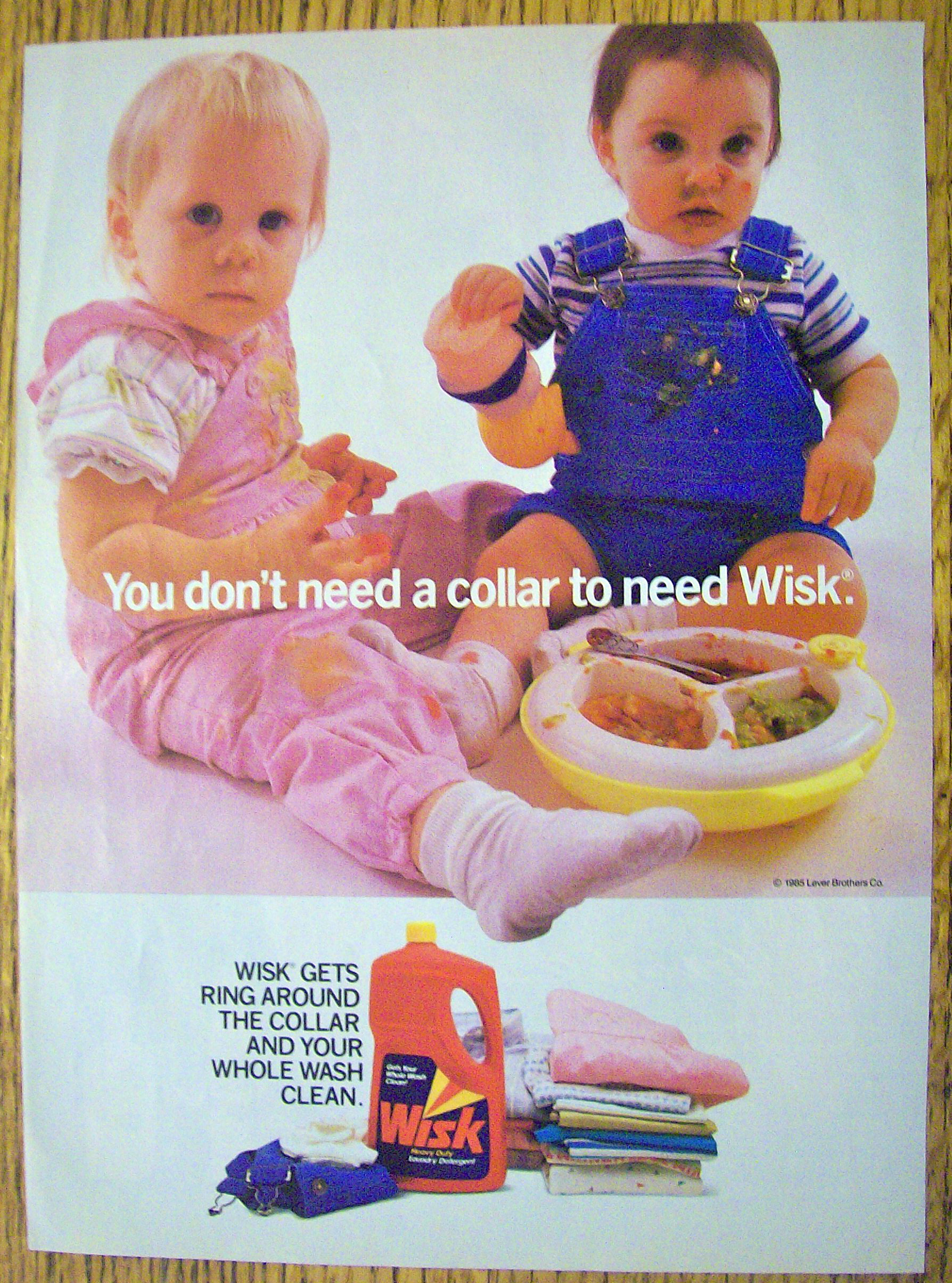 1986 Wisk Detergent with Two Babies In Dirty Clothes