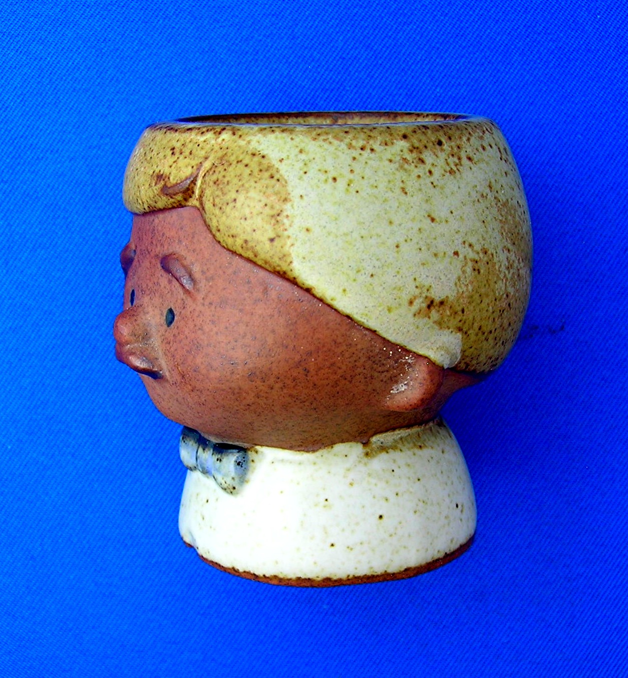 SET OF FOUR POTTERY EGG CUPS Mom Dad and 2 Kids