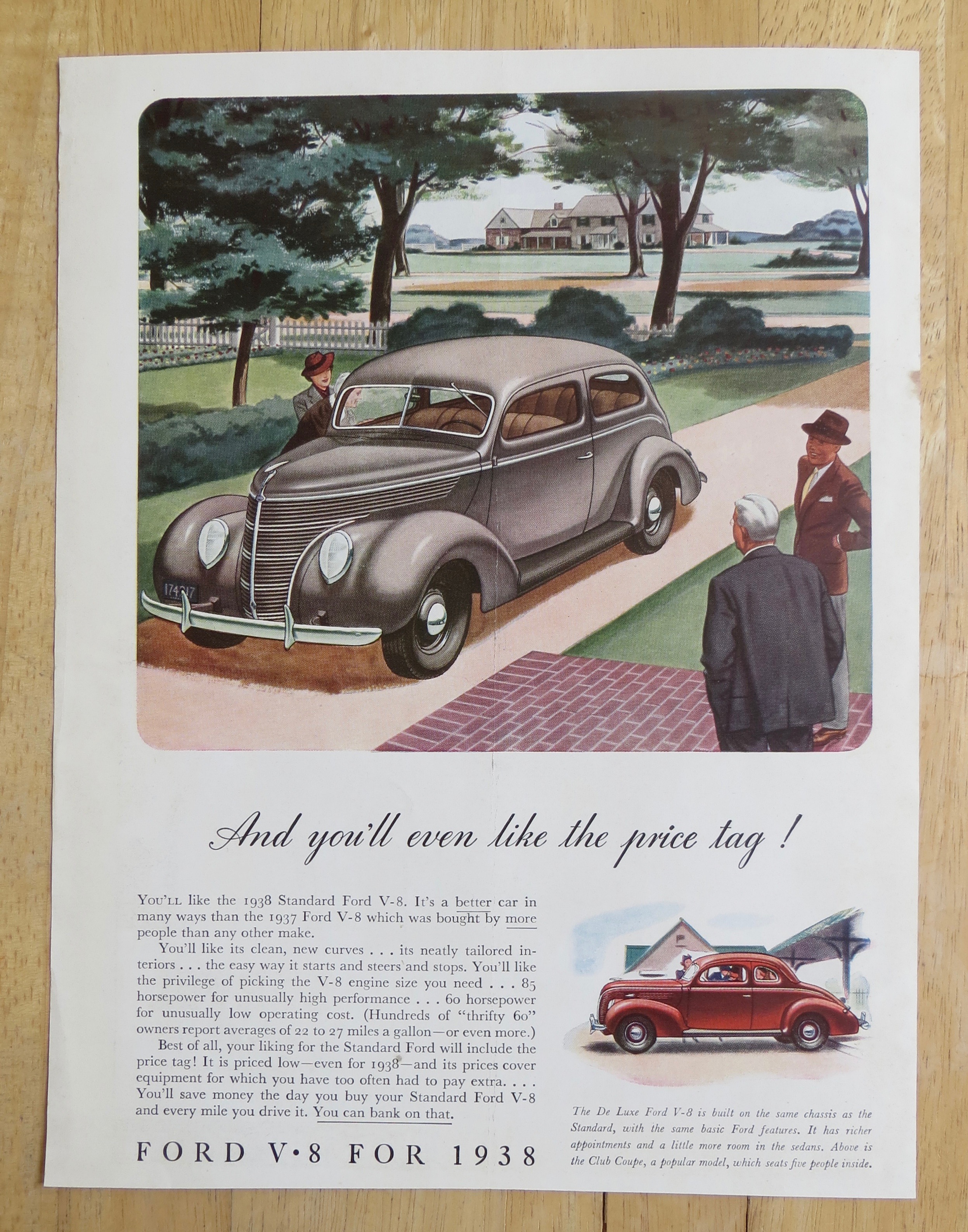 1938 Ford V-8 with People Looking at a Ford