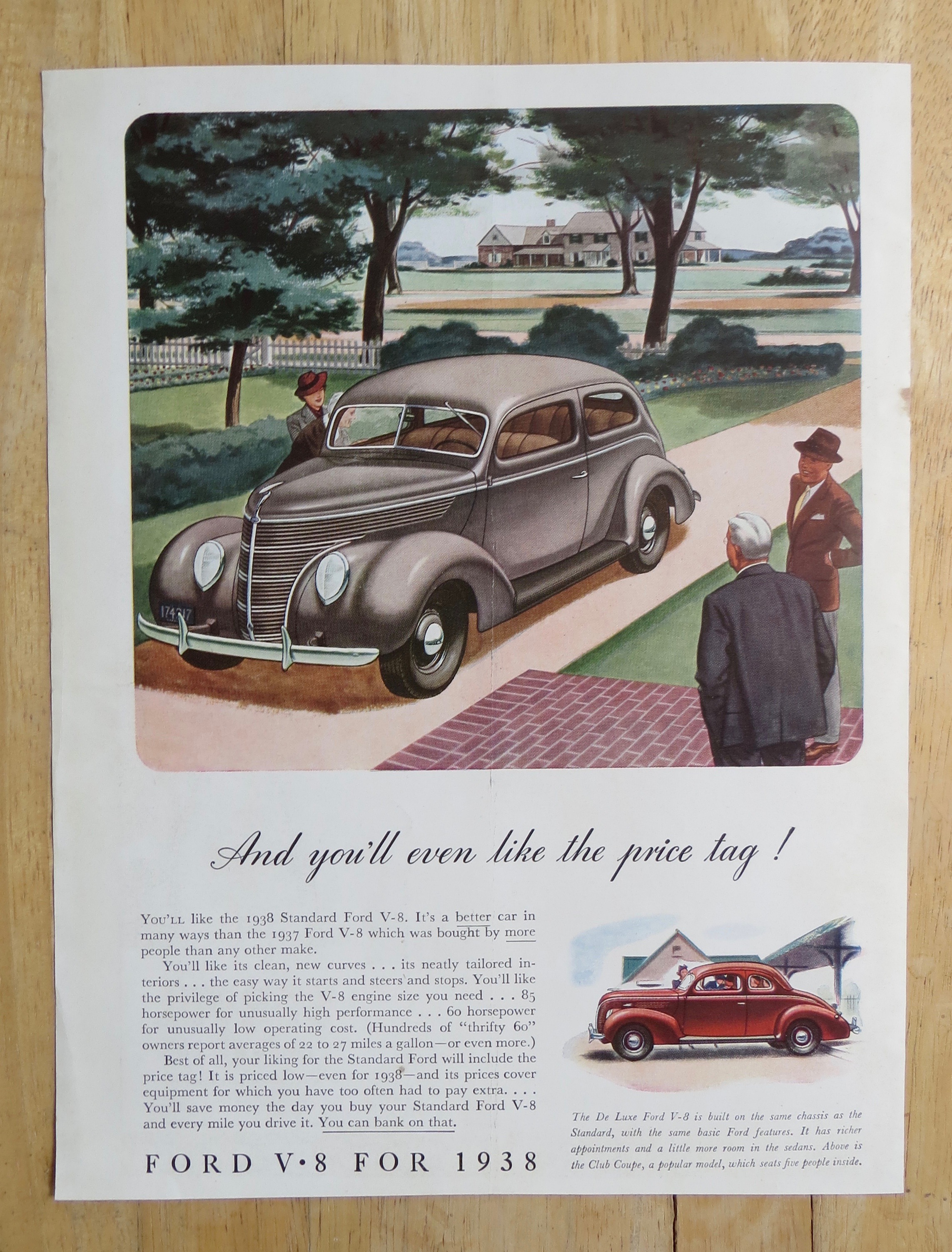 1938 Ford V-8 with People Looking at a Ford