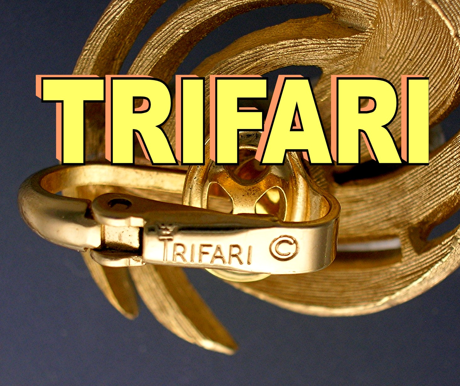 Crown Trifari Brushed Gold Swirl  Pull Clip Earrings