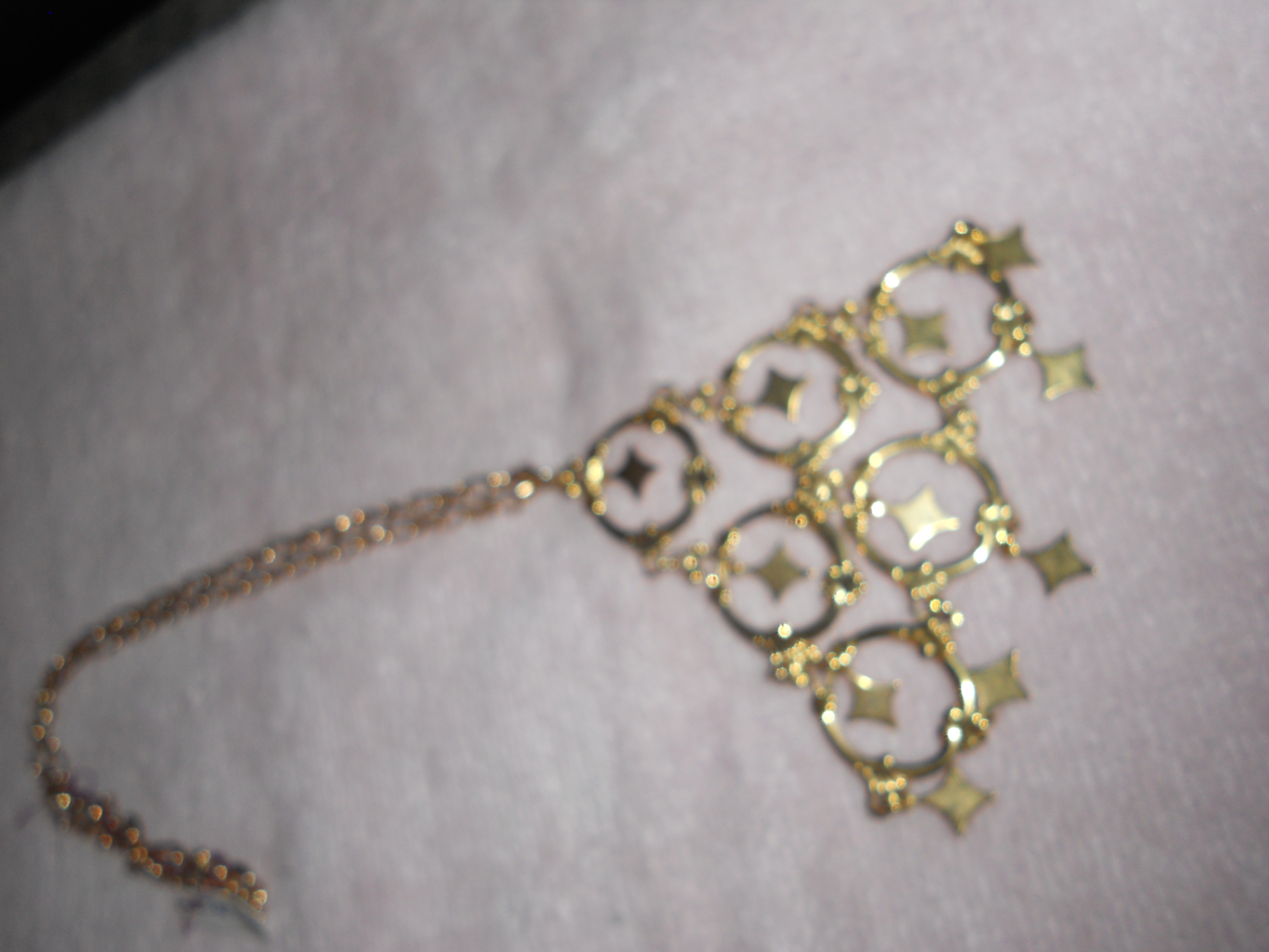 Necklace Pyramid with Circles and Stars