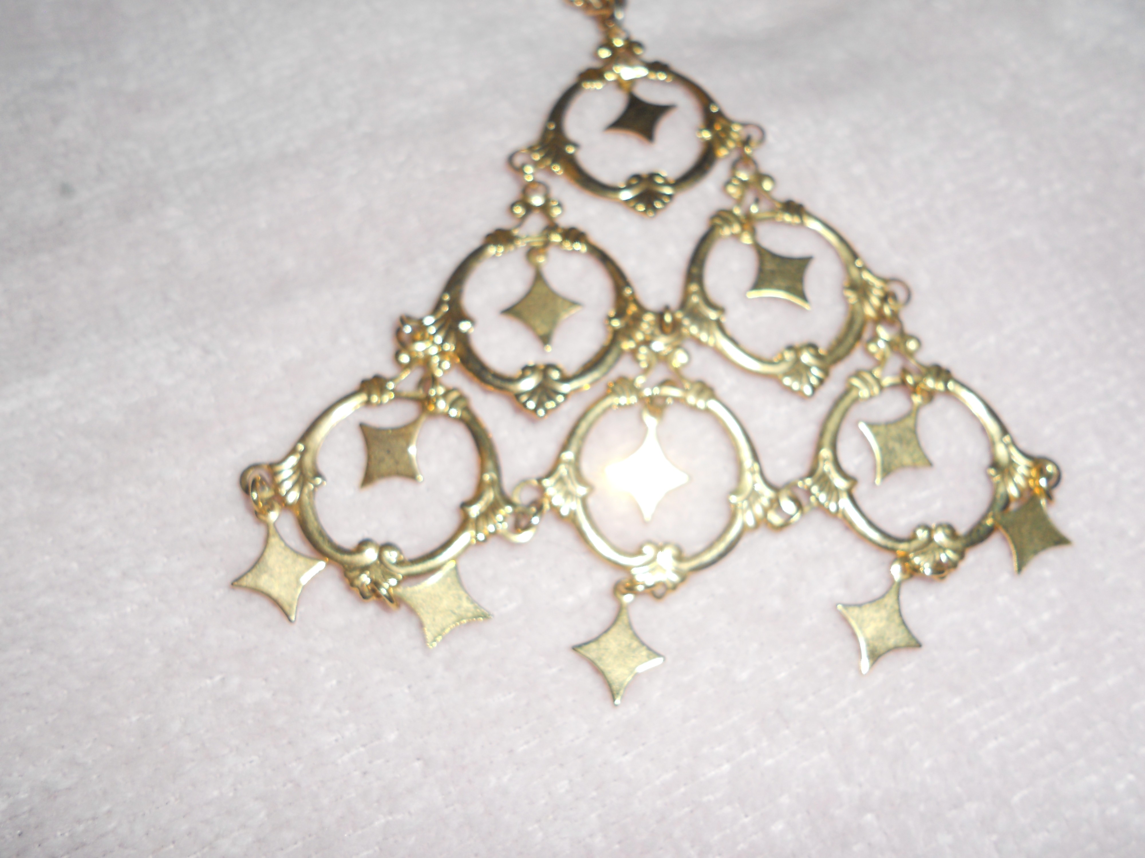 Necklace Pyramid with Circles and Stars