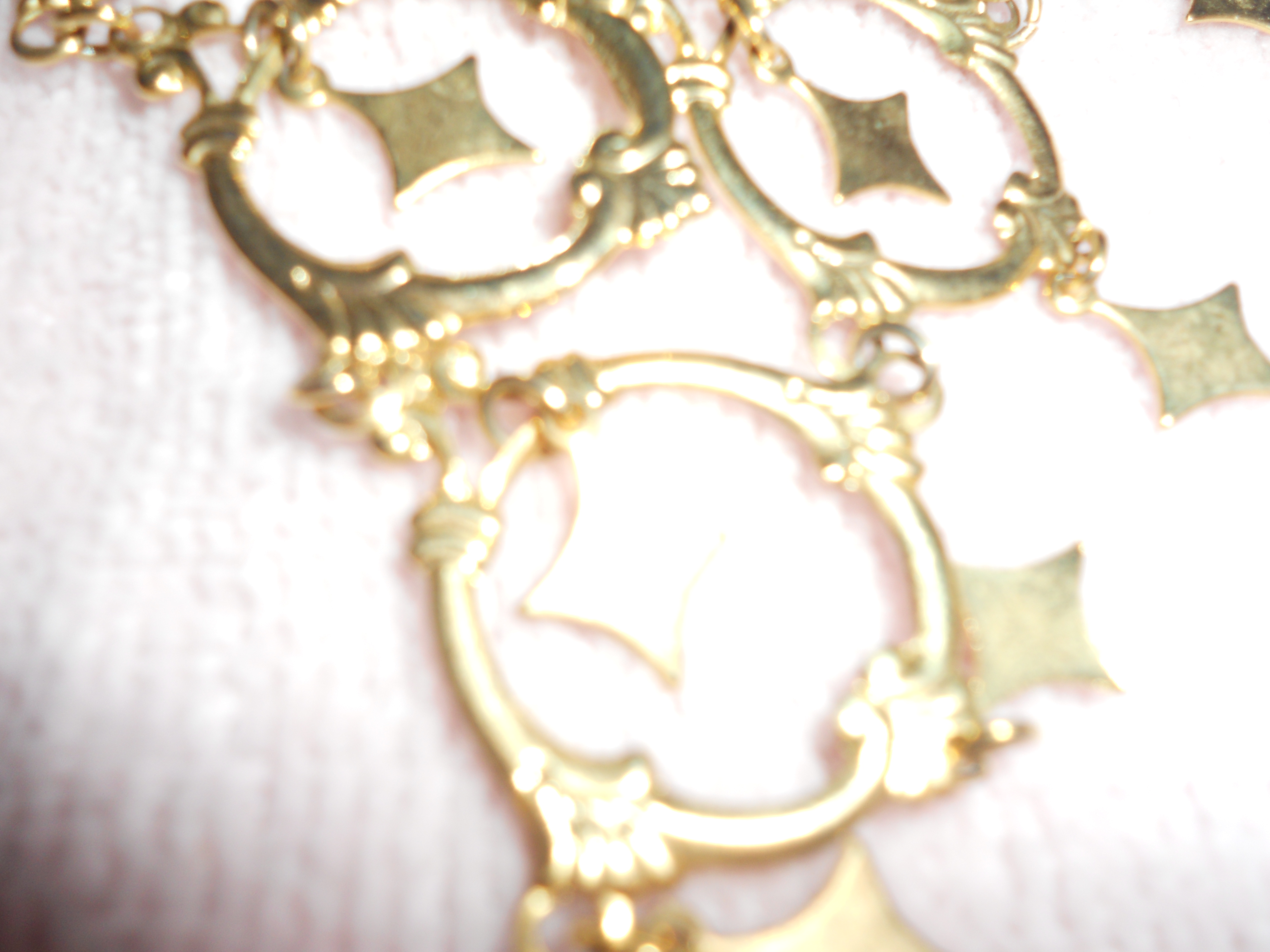 Necklace Pyramid with Circles and Stars