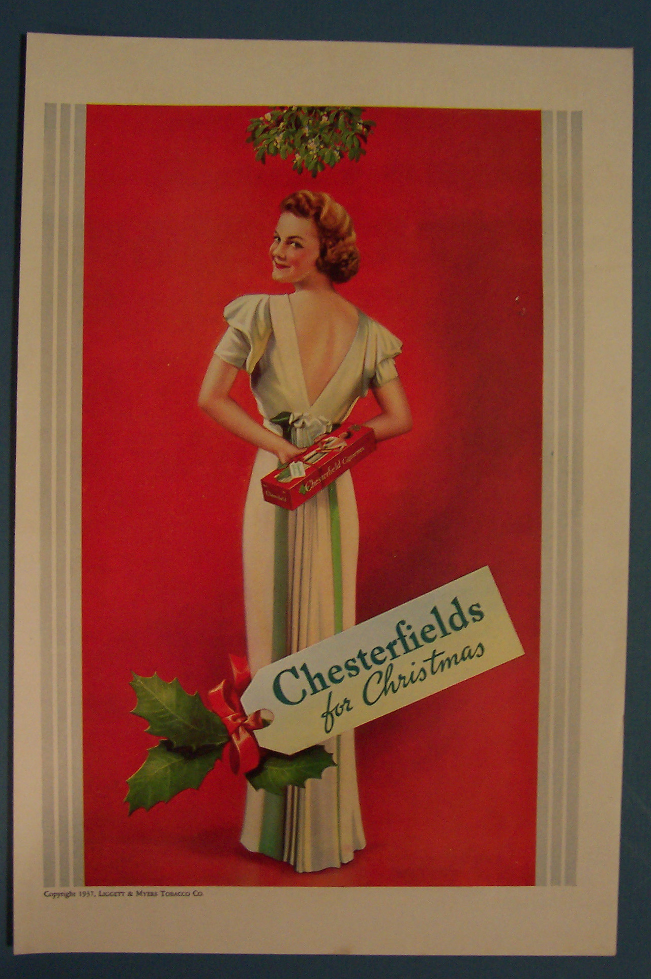 1938 Chesterfield  Cigarettes with Woman Holding Carton