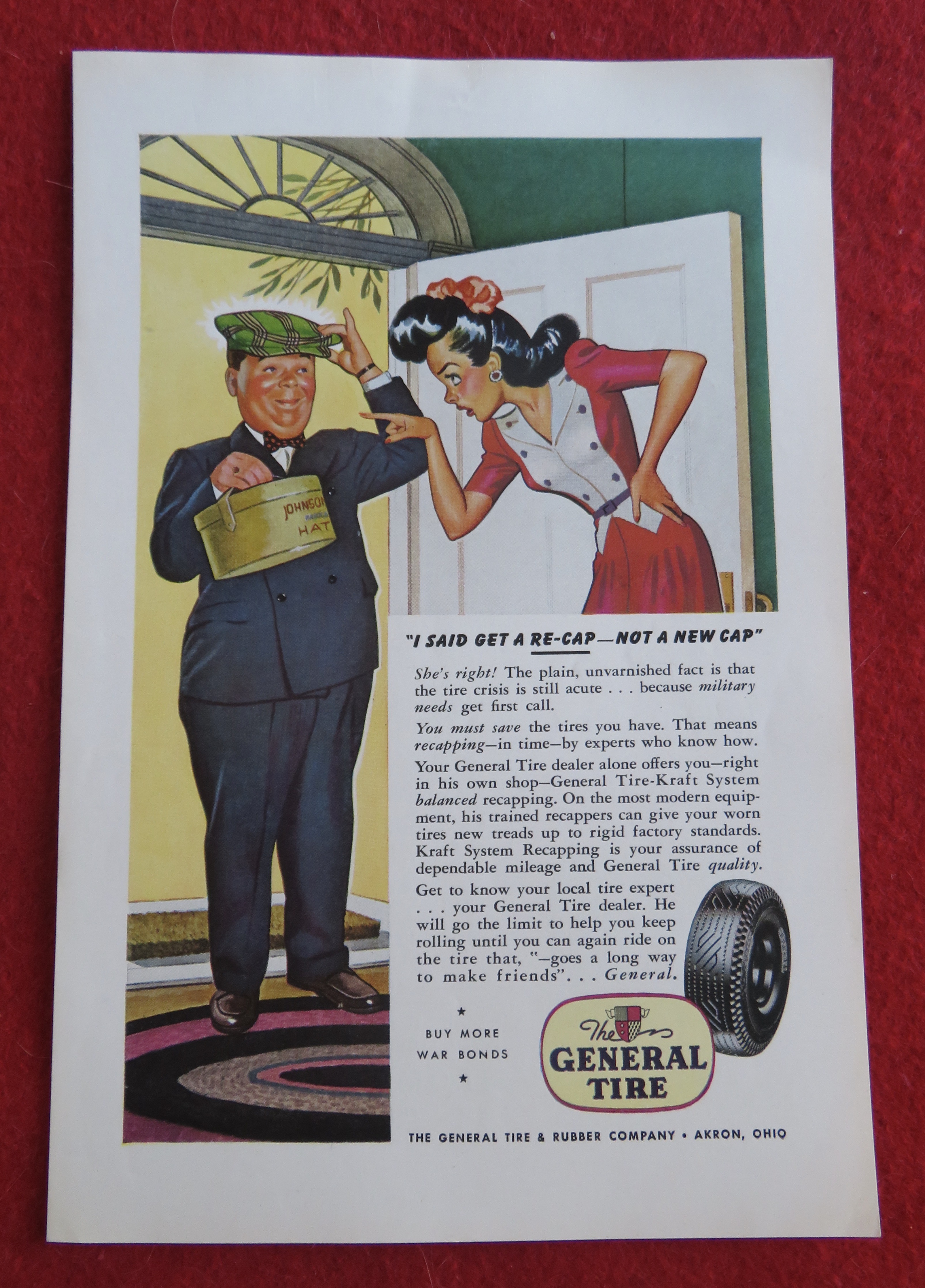 1944 General Tires with Lady Pointing To Hat Box