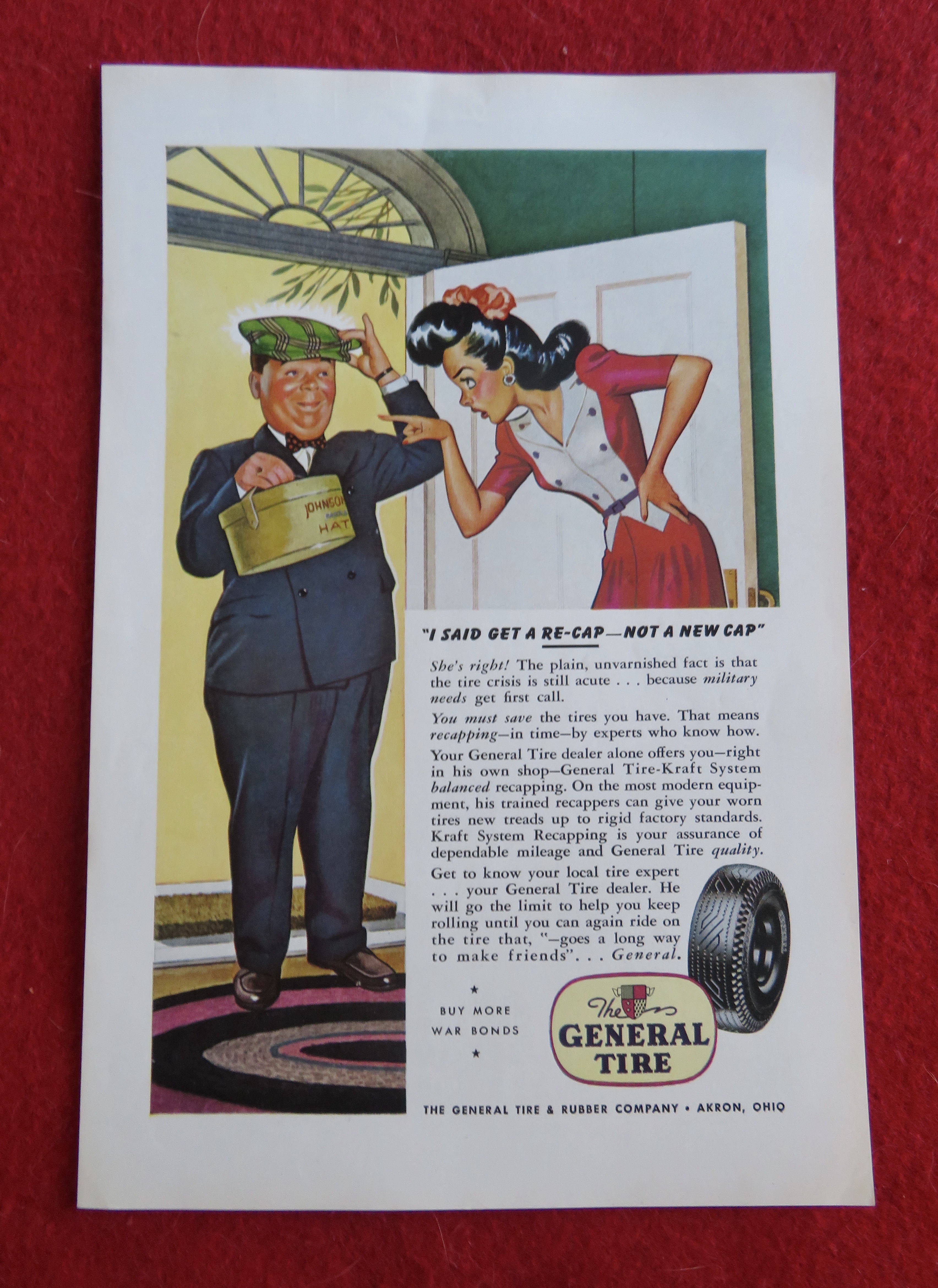 1944 General Tires with Lady Pointing To Hat Box