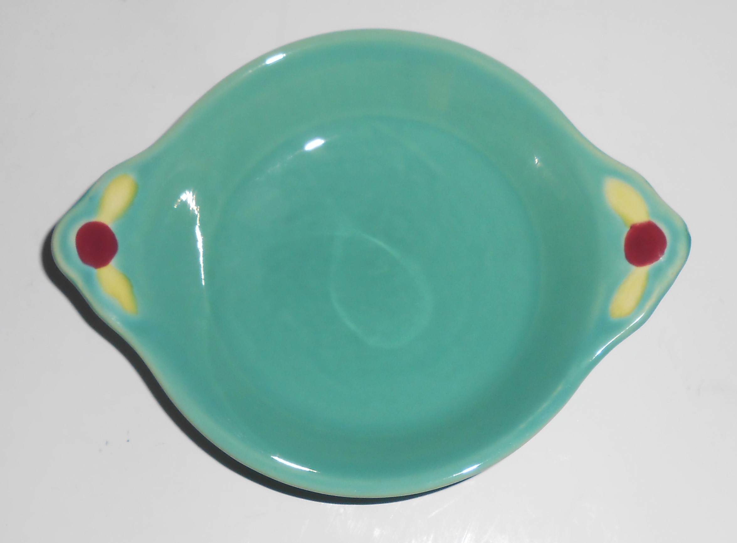 This is an offering for a lovely Coors Pottery Rosebud