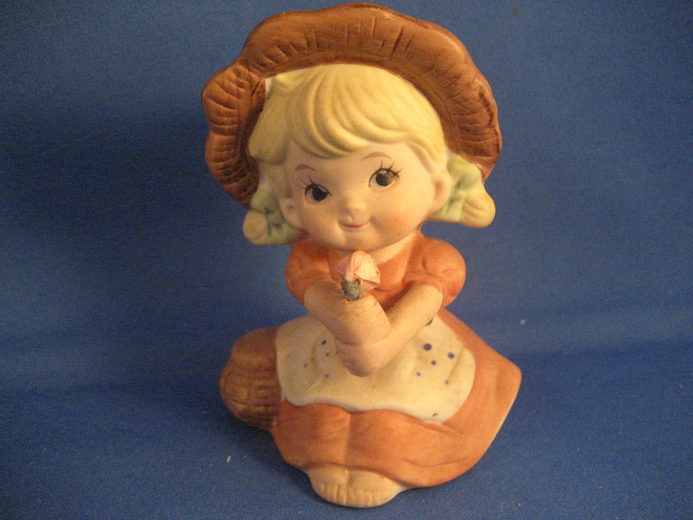 Little Girl with Flower Figurine