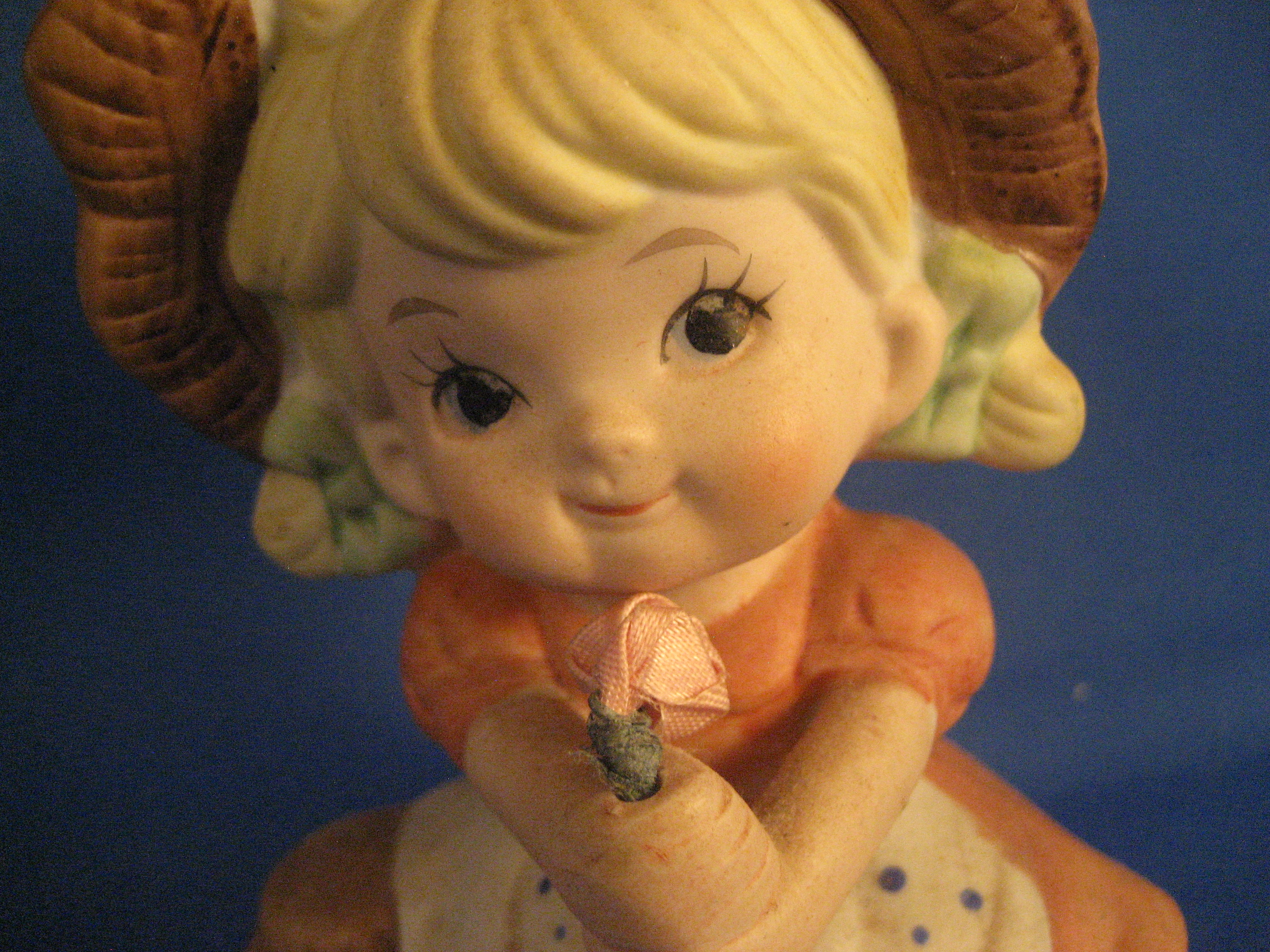 Little Girl with Flower Figurine