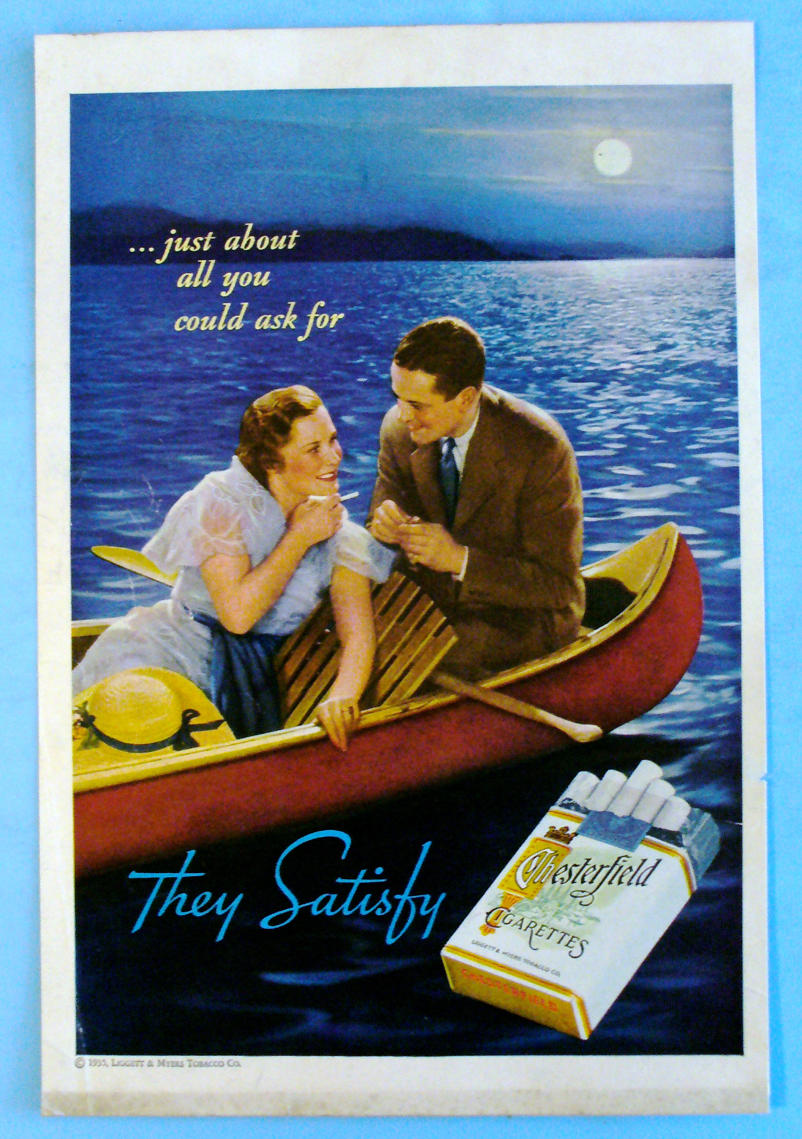 1935 Chesterfield Cigarettes w/ Couple Sailing In Boat