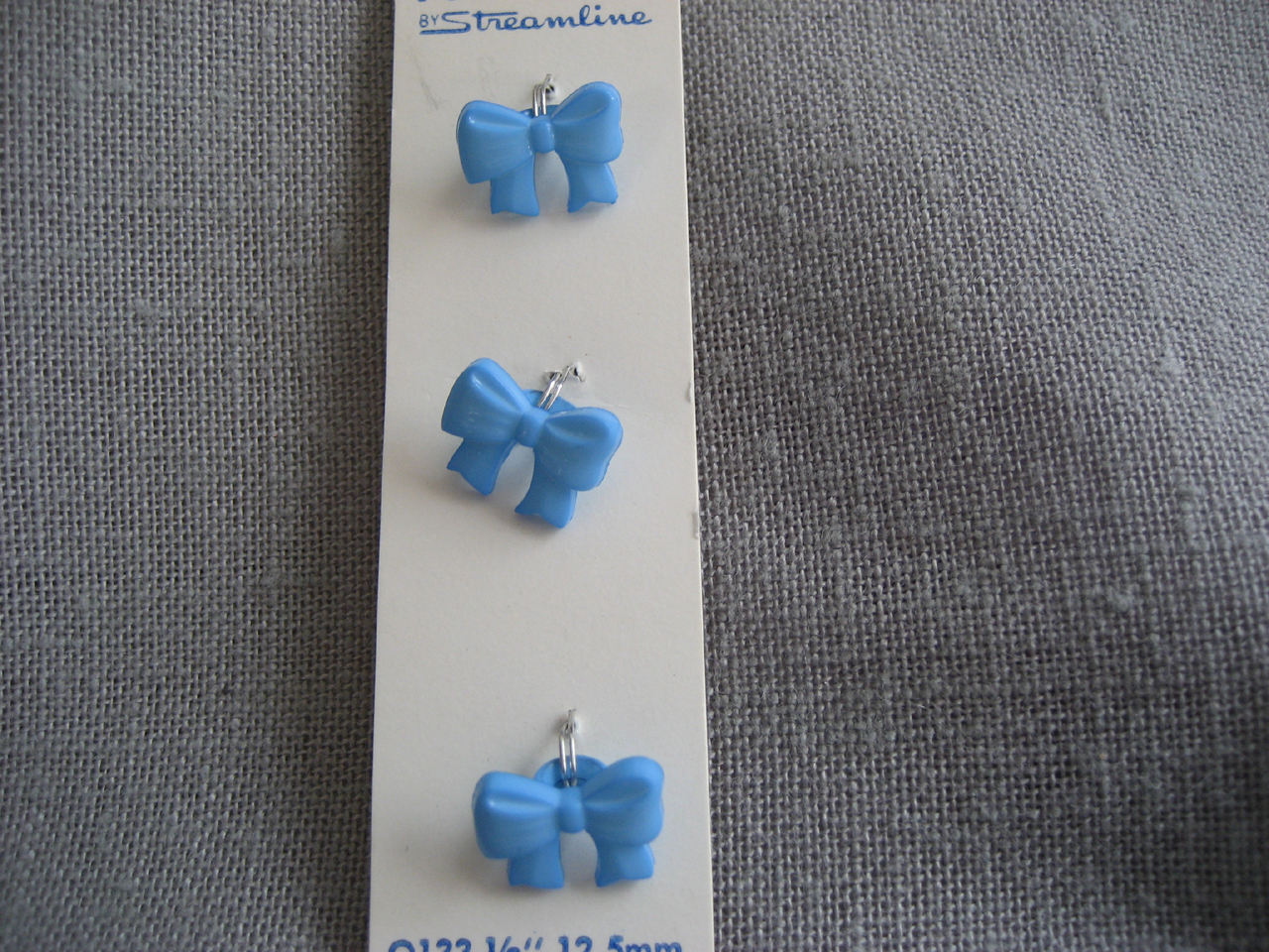 Three Bow Buttons