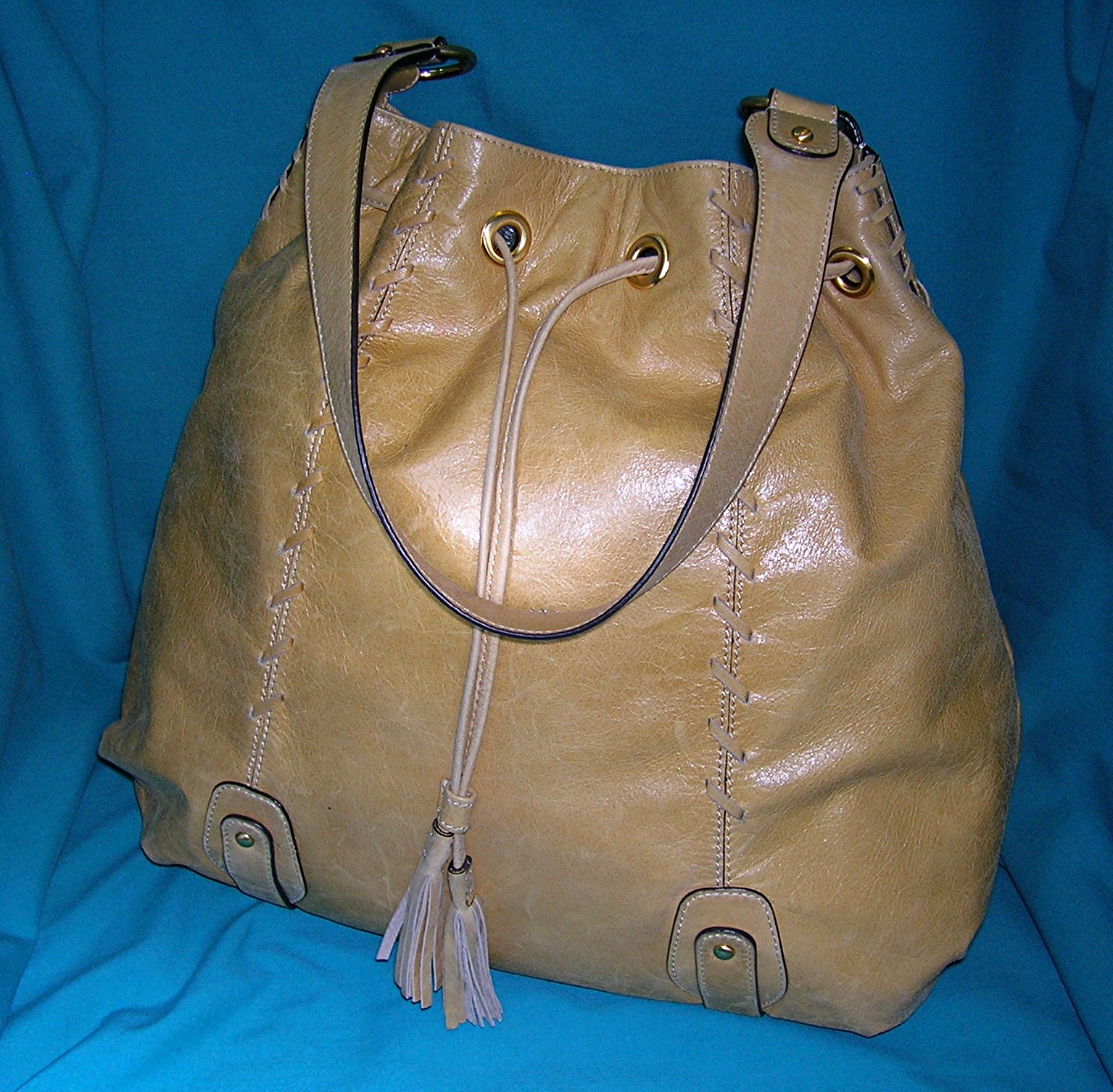Fossil Tan Leather Drawstring Tote Bag.