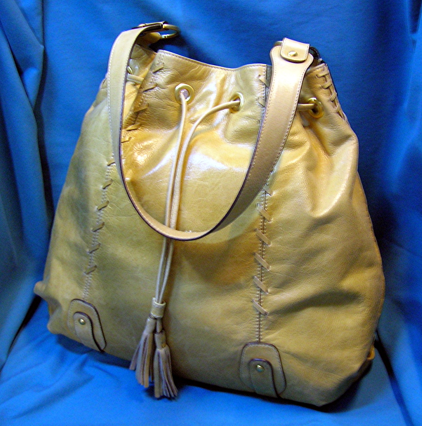 Fossil Tan Leather Drawstring Tote Bag.