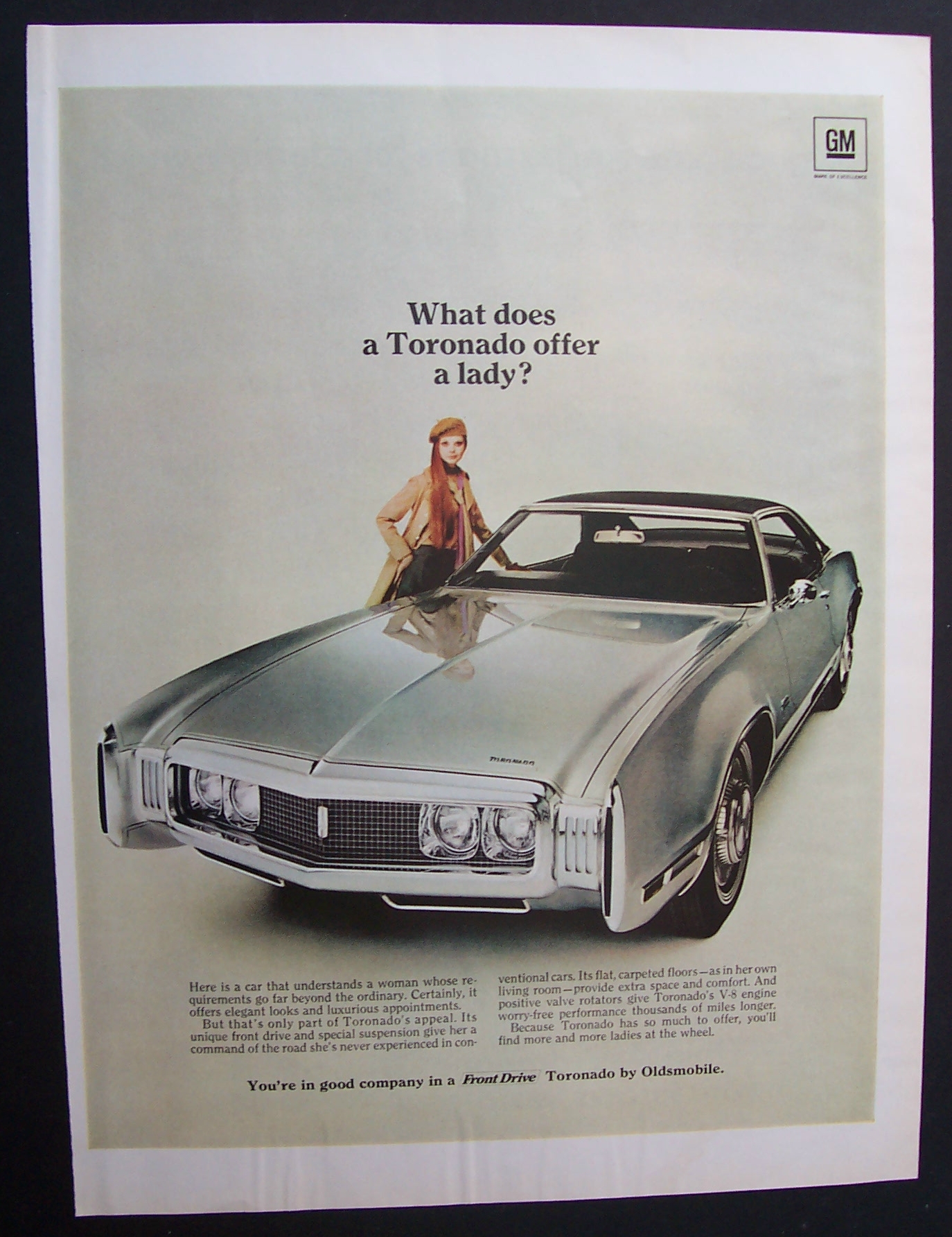 1969 Oldsmobile Toronado with a Lovely Woman