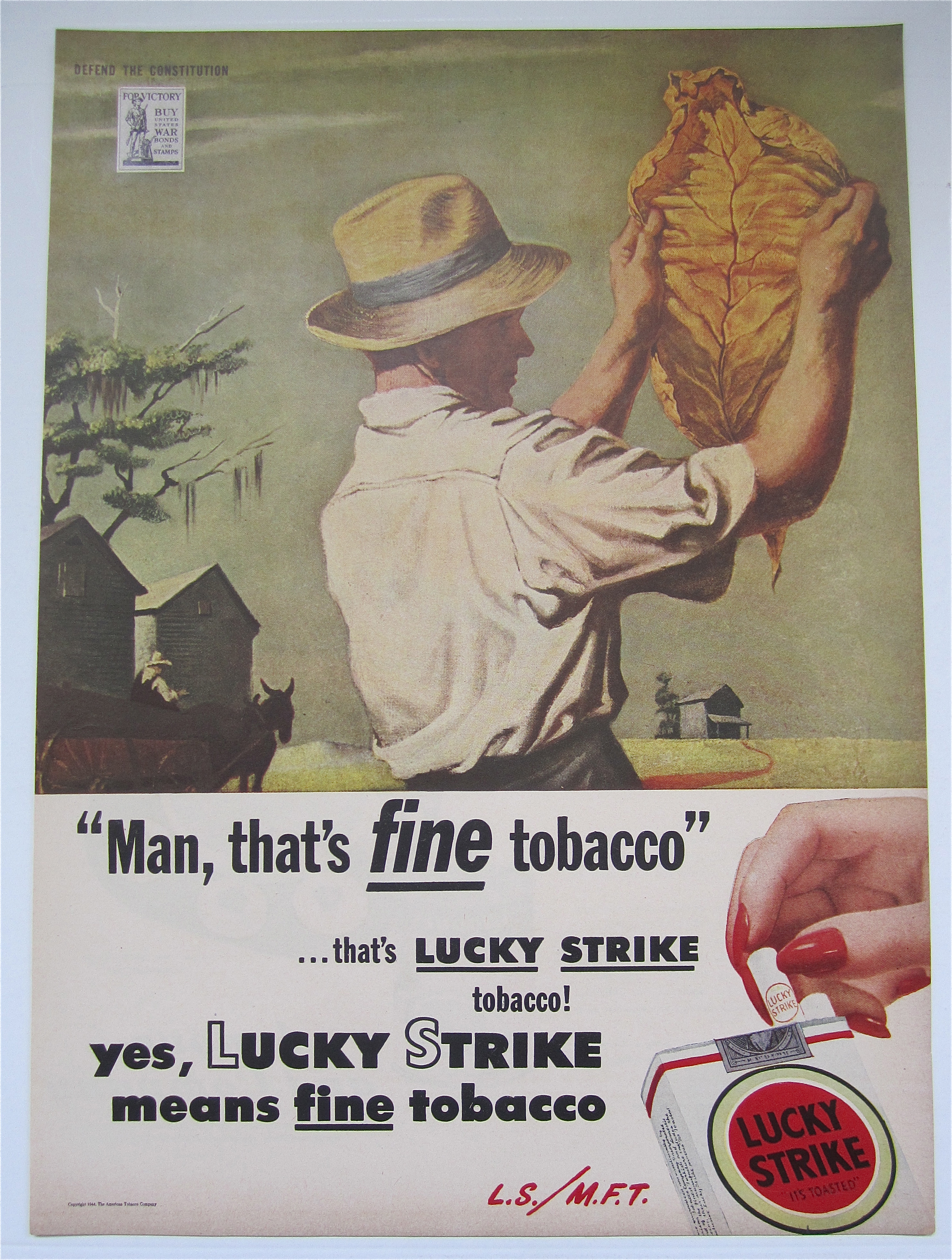 1944 Lucky Strike Cigarettes w/ Man Inspecting Leaf