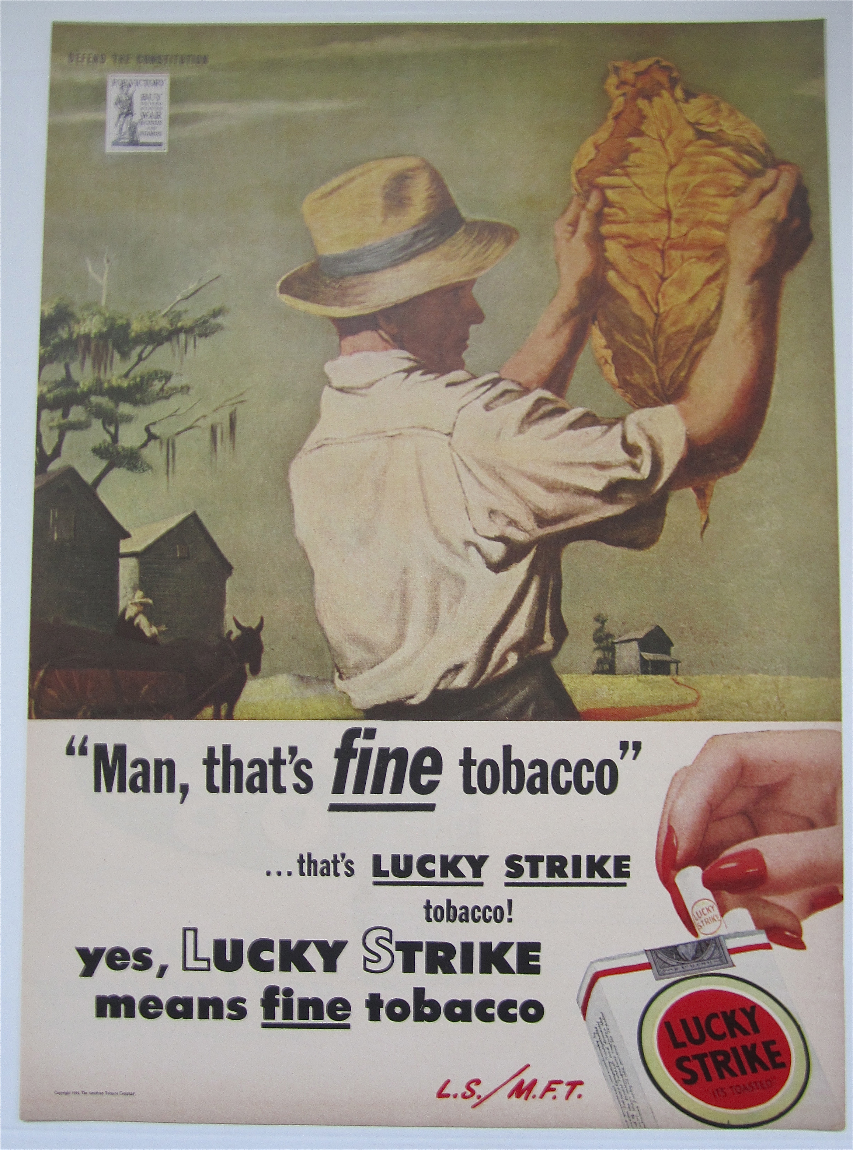 1944 Lucky Strike Cigarettes w/ Man Inspecting Leaf
