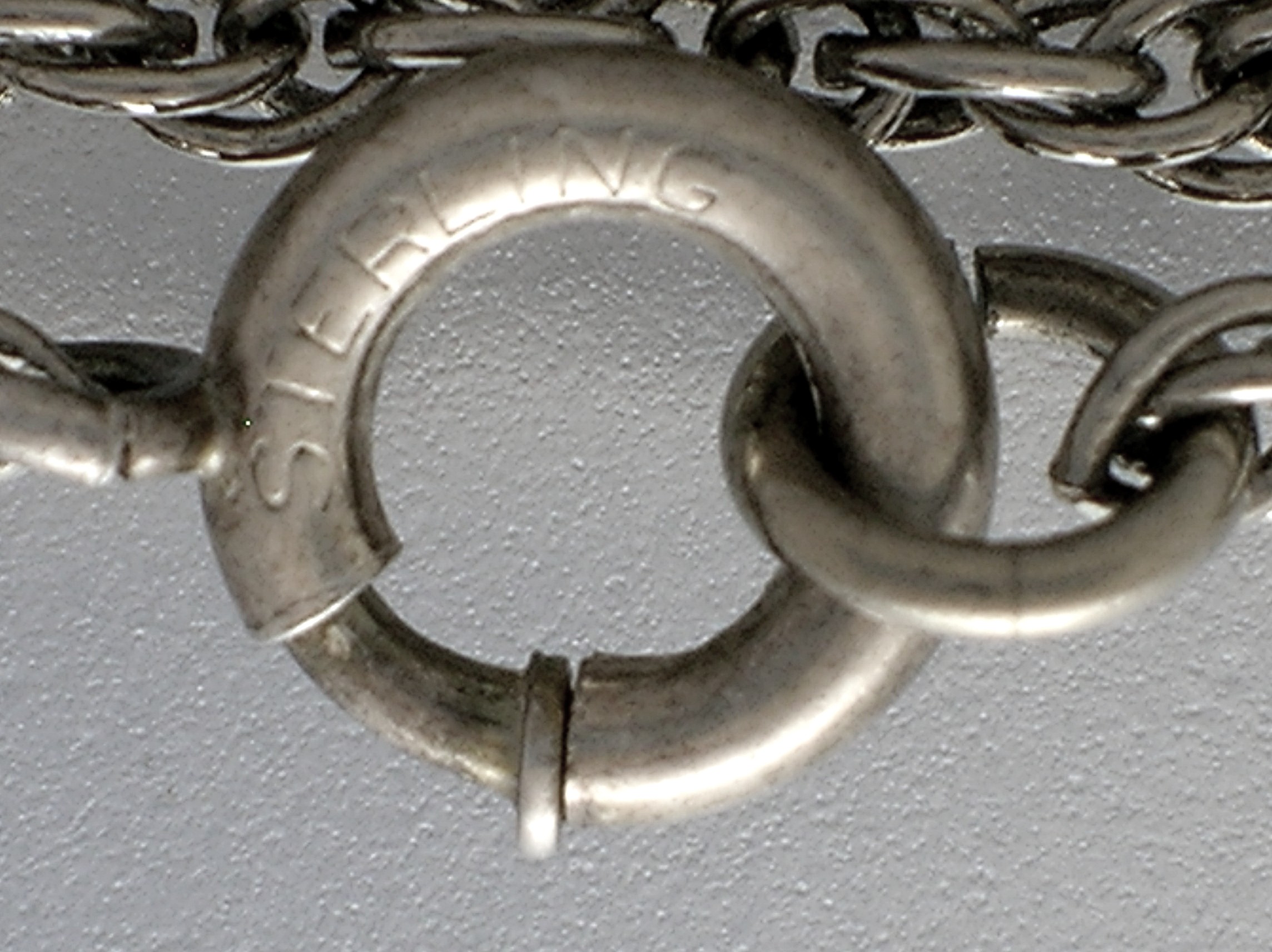 25 Inch chain 1 7/8 inches wide 1 3/4 inches  Elephant