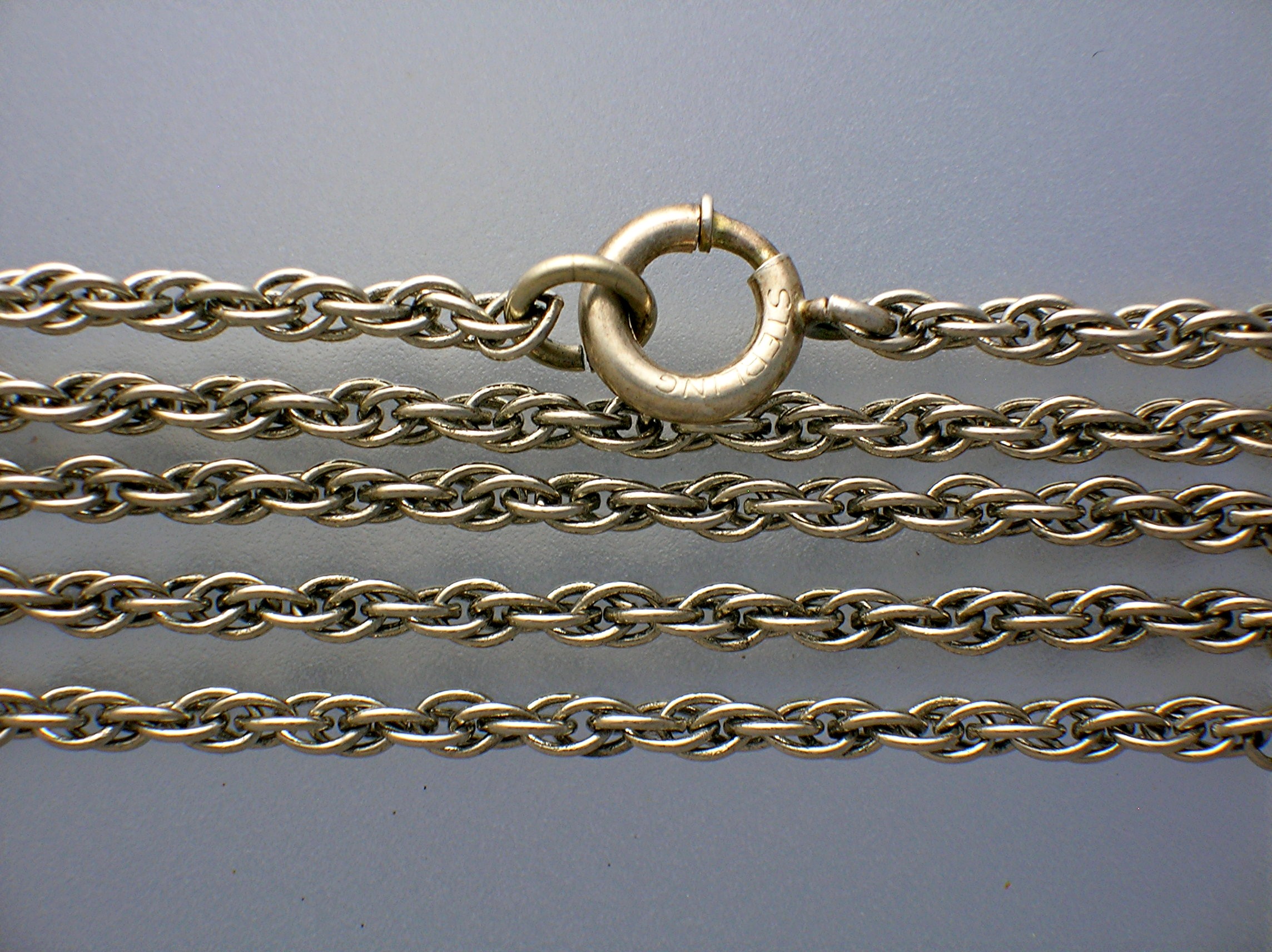 25 Inch chain 1 7/8 inches wide 1 3/4 inches  Elephant