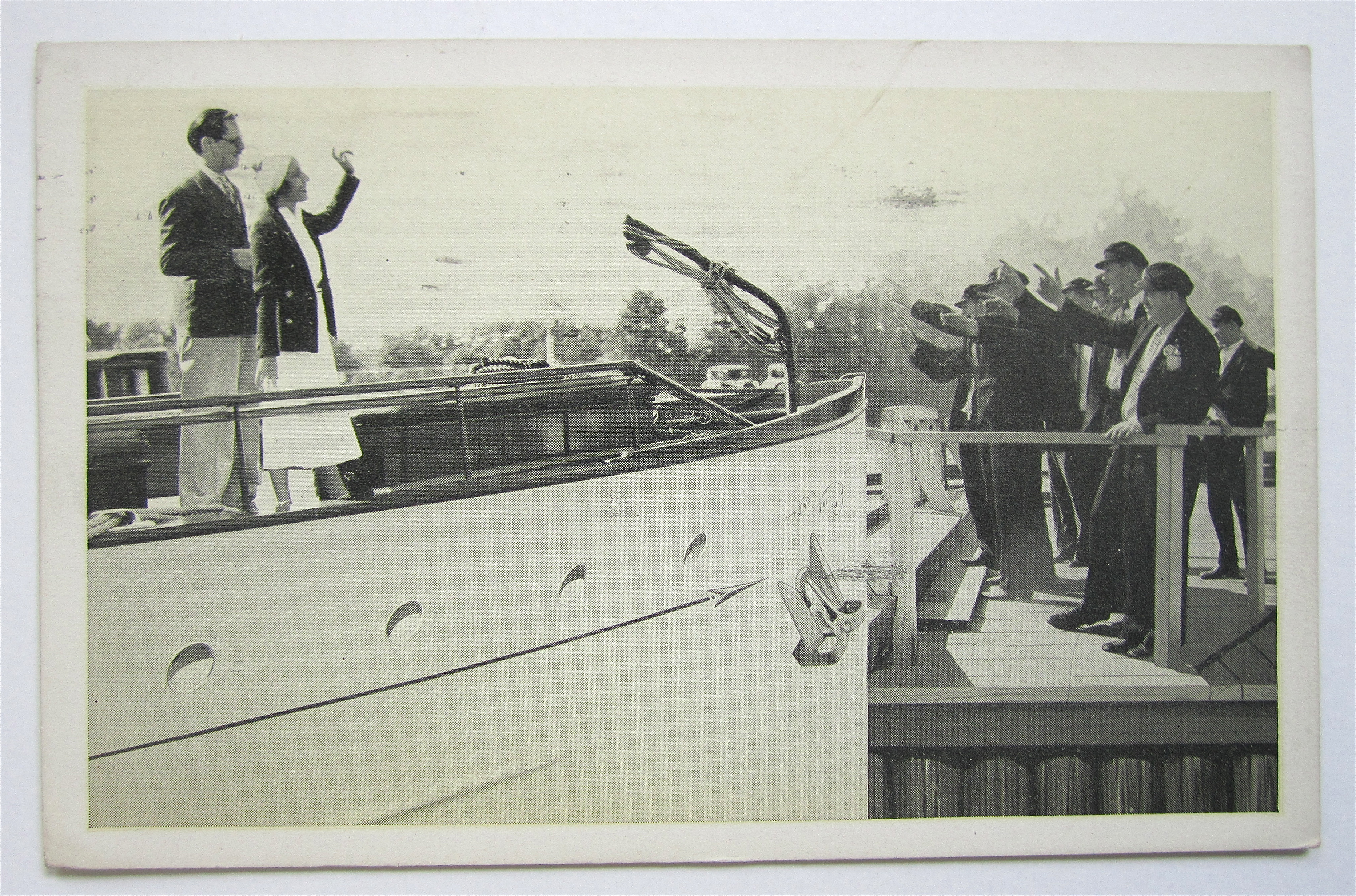 Man & Woman On Boat Waving Goodbye To People Postcard