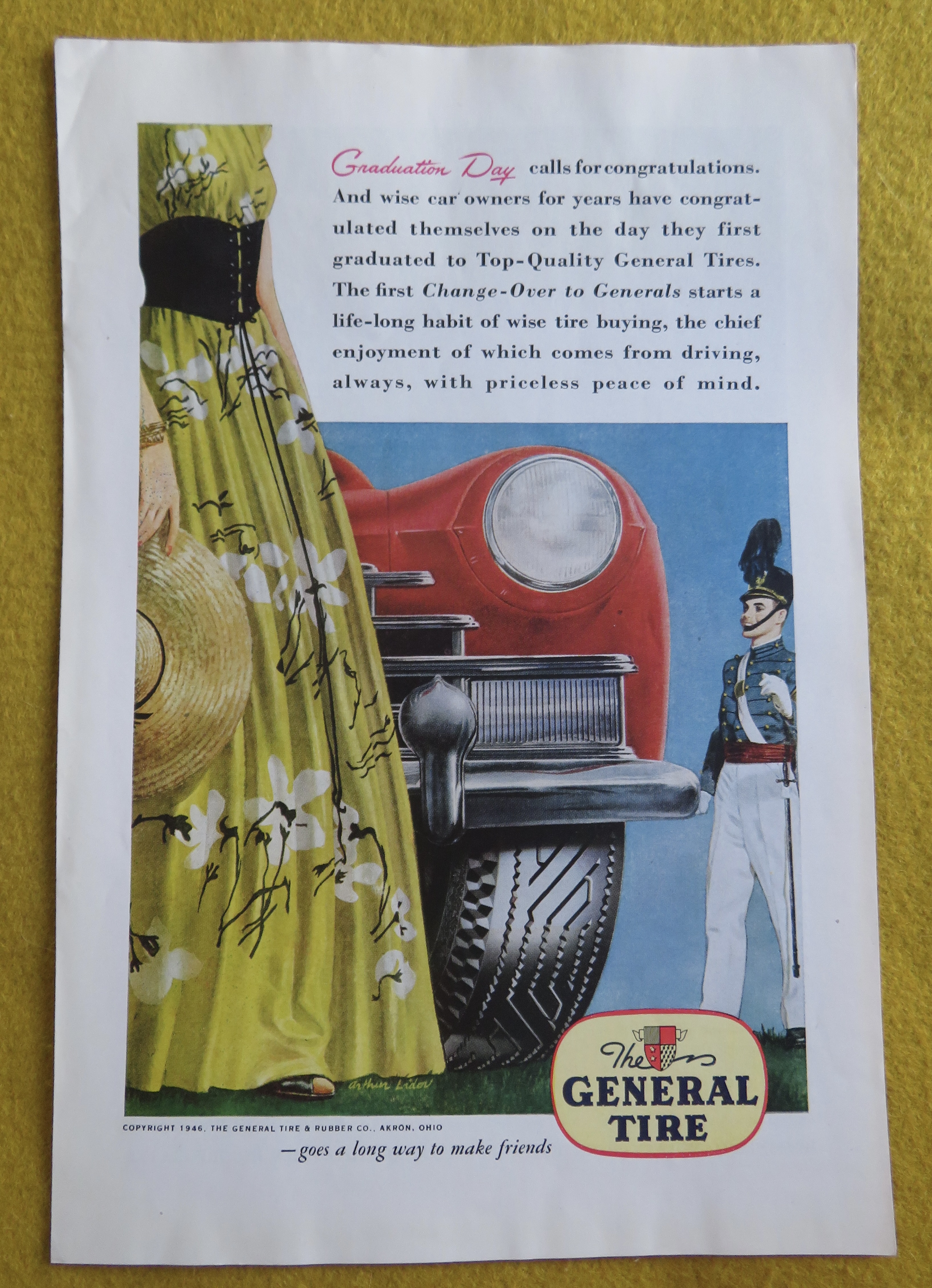 1946 General Tires with Soldier Standing By Car
