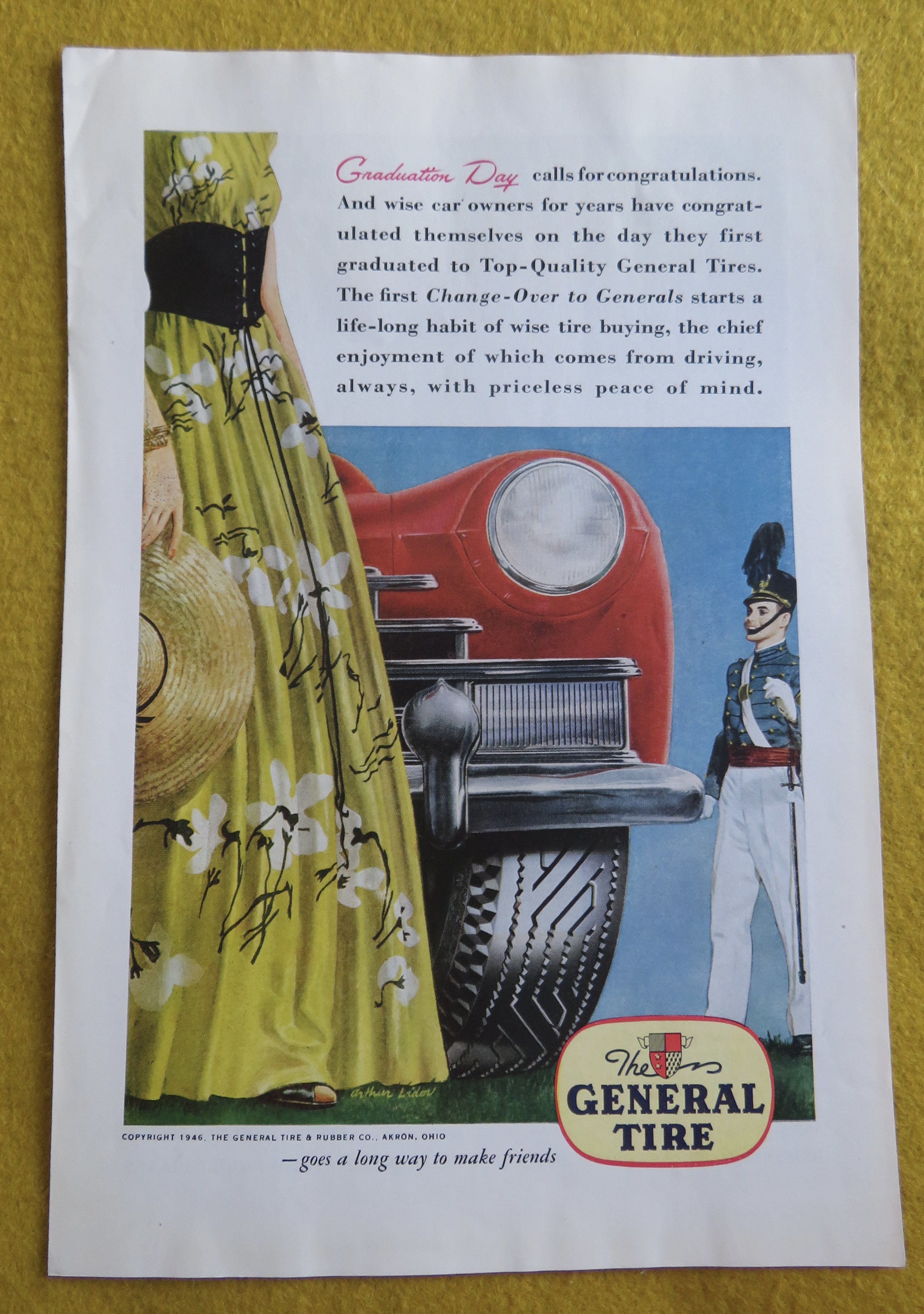 1946 General Tires with Soldier Standing By Car