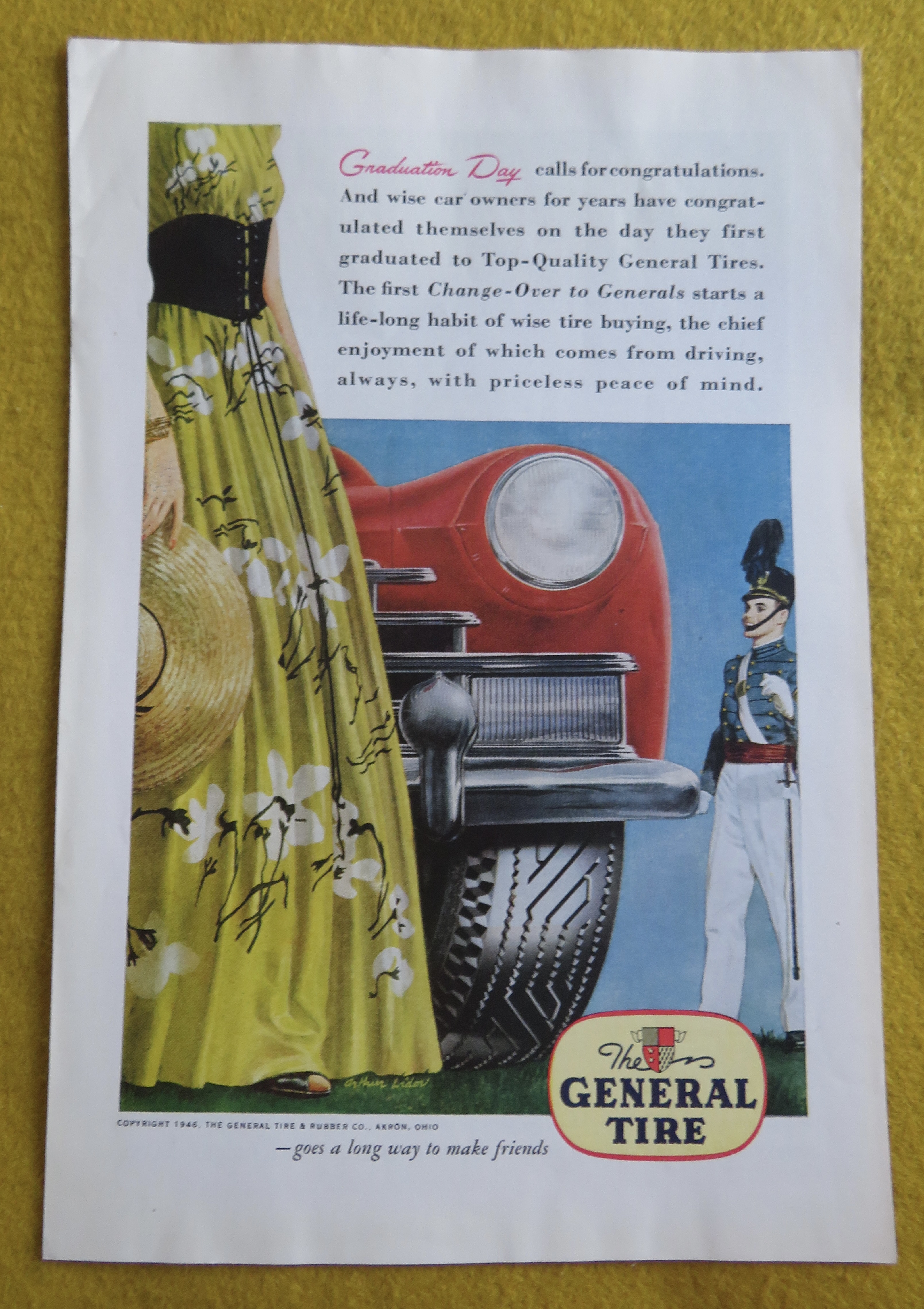 1946 General Tires with Soldier Standing By Car